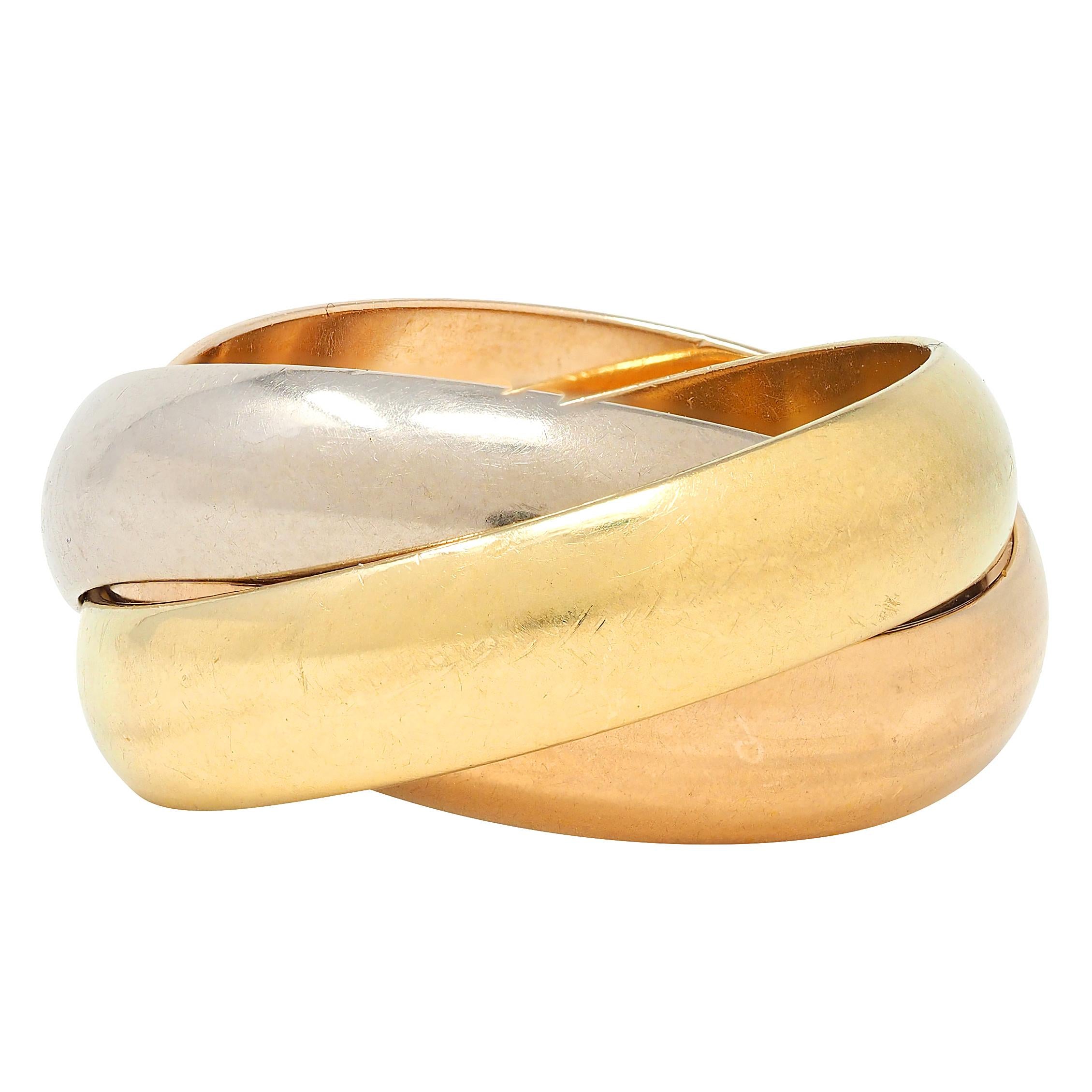 Cartier 1980's 18 Karat Tri-Gold Vintage Trinity Rolling Band Ring