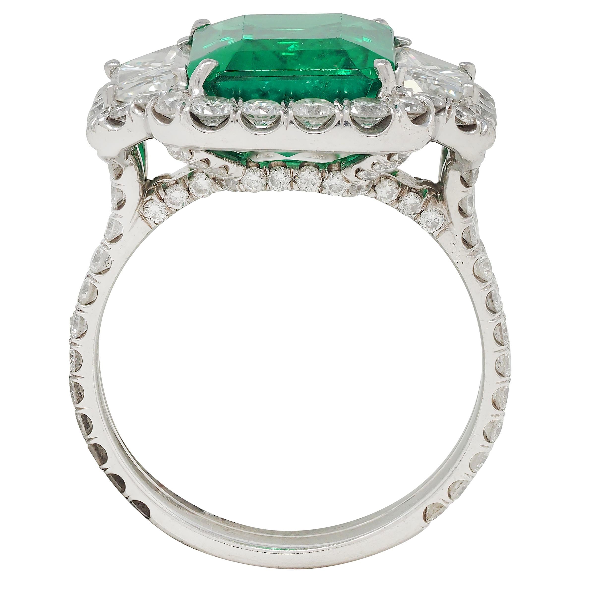 Contemporary 7.90 CTW Emerald Diamond Platinum Vintage Three Stone Halo Ring GIA