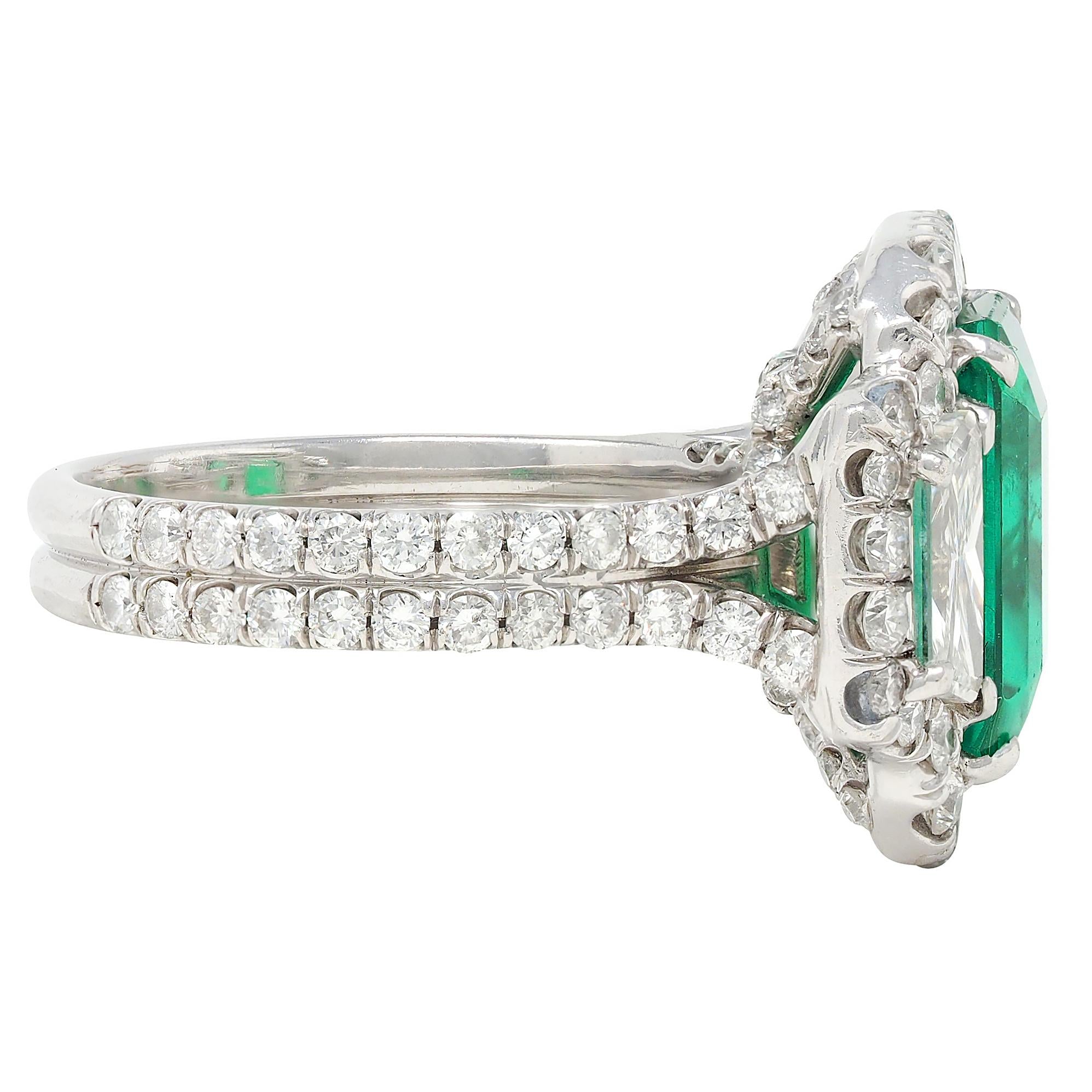 Contemporary 7.90 CTW Emerald Diamond Platinum Vintage Three Stone Halo Ring GIA