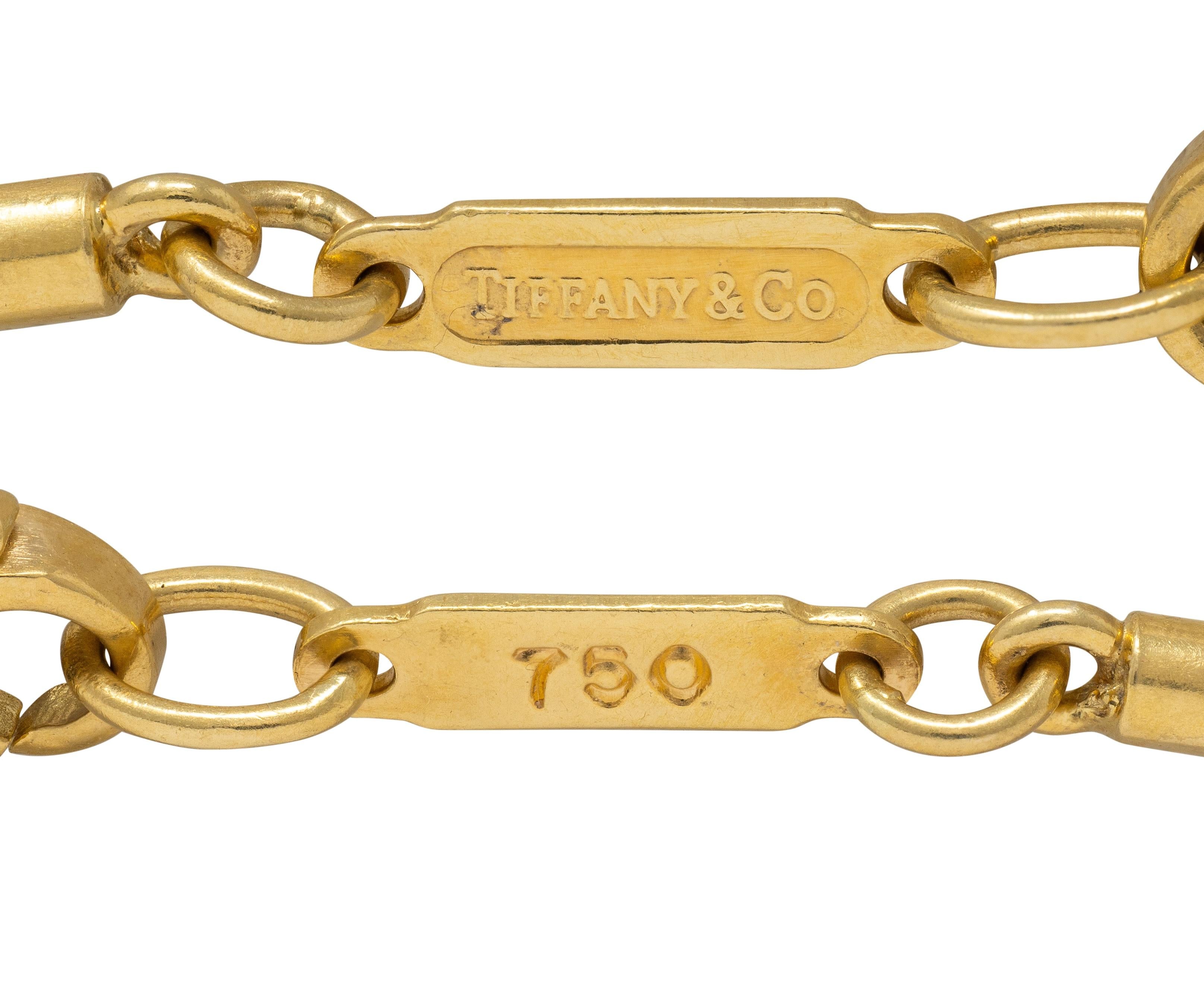 Tiffany & Co. 1990's 18K Yellow Gold Vintage Minimalist Feather Pendant Necklace