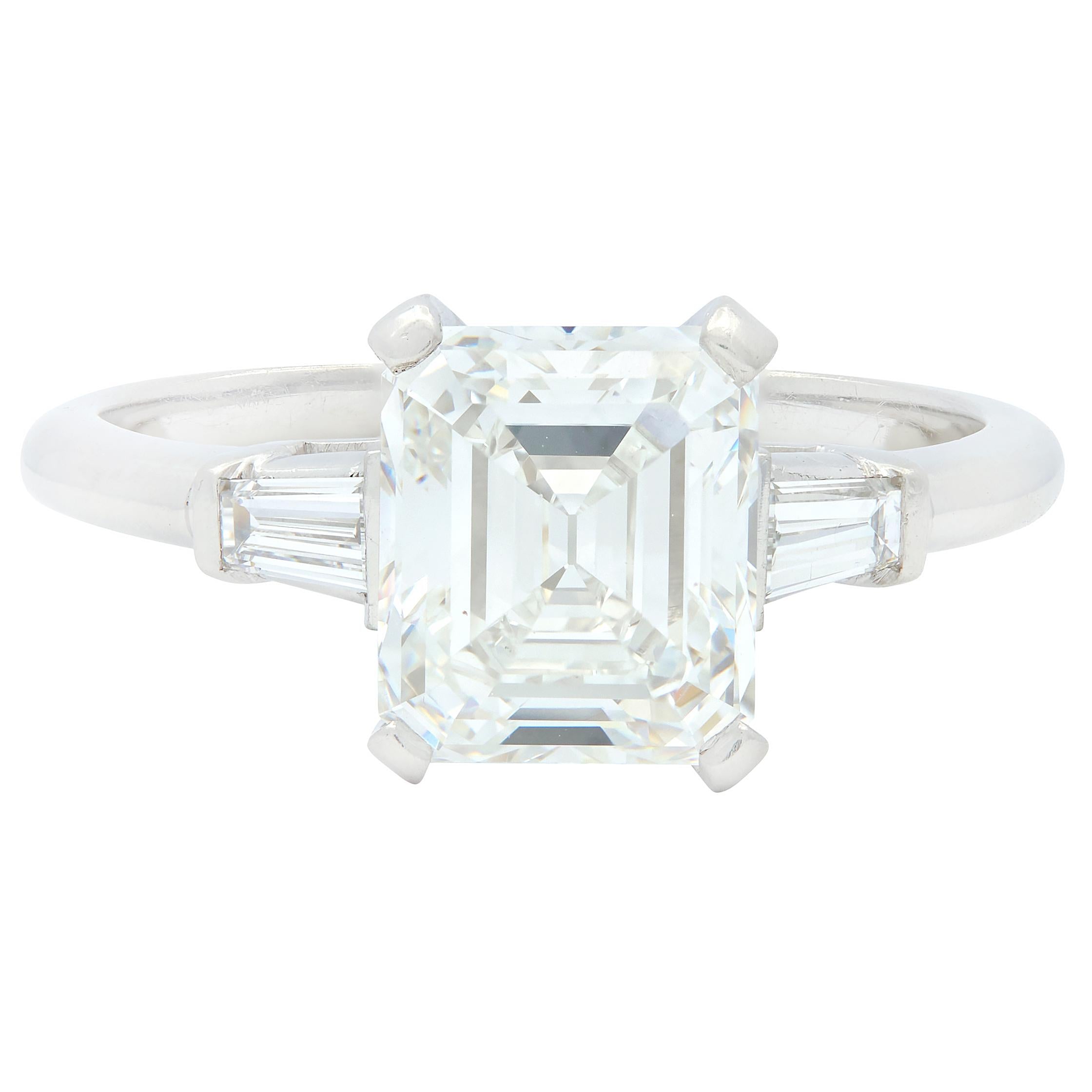 Mid-Century Emerald Cut Diamond Platinum Three Stone Vintage Engagement Ring