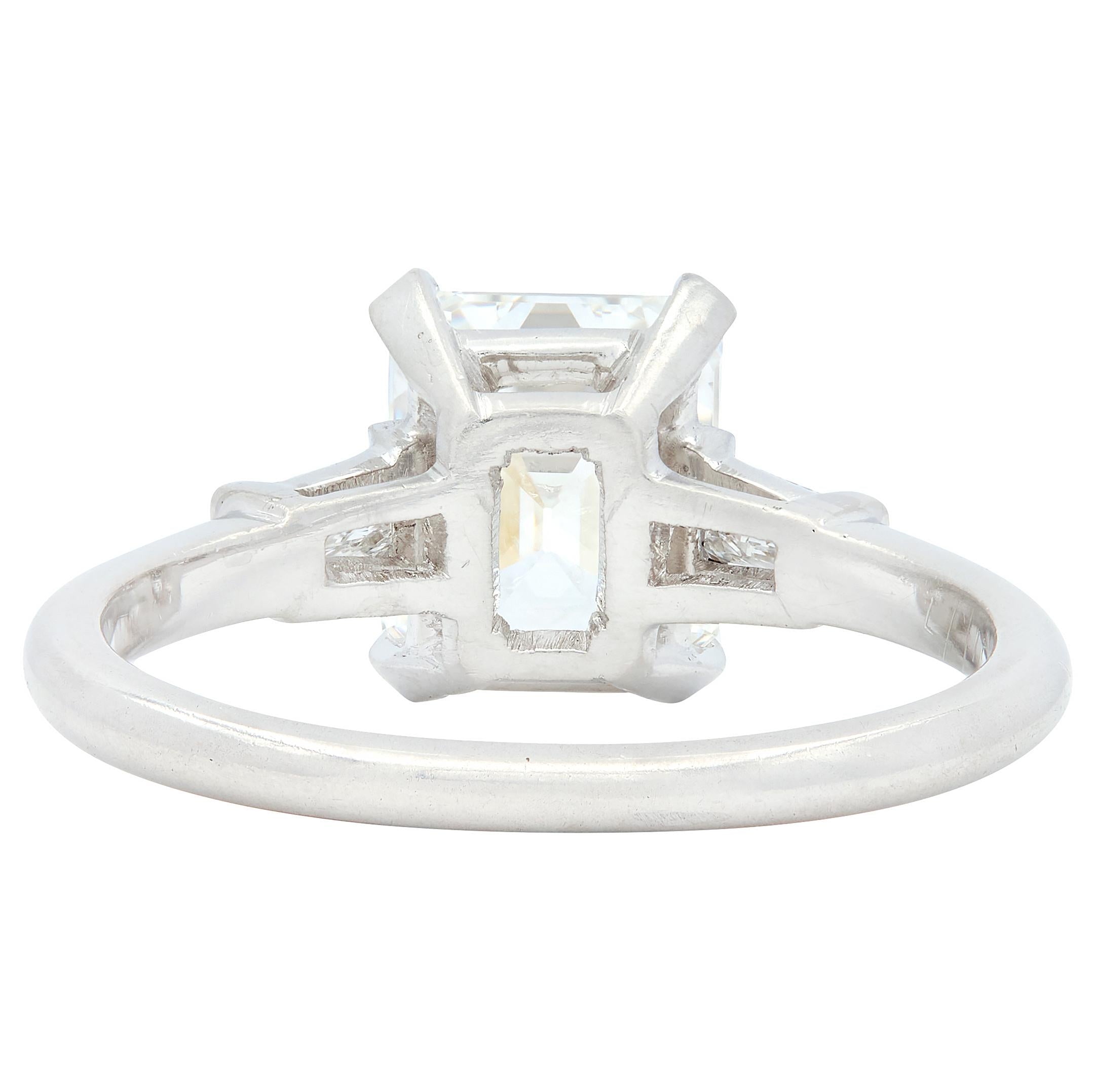 Mid-Century Emerald Cut Diamond Platinum Three Stone Vintage Engagement Ring