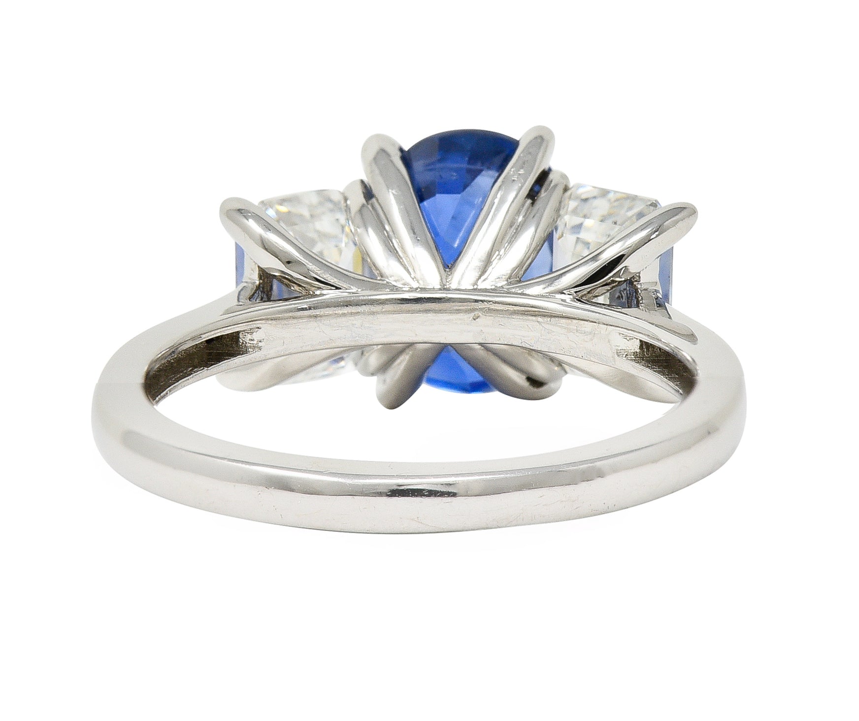 Contemporary 4.82 CTW Oval Cut No Heat Sapphire Emerald Cut Diamond Platinum Three Stone Ring GIA Wilson's Estate Jewelry