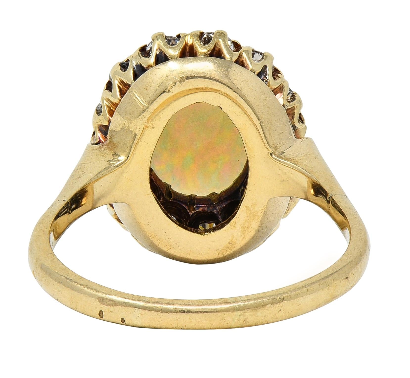 Edwardian Opal Diamond Platinum 14 Karat Yellow Gold Antique Halo Ring