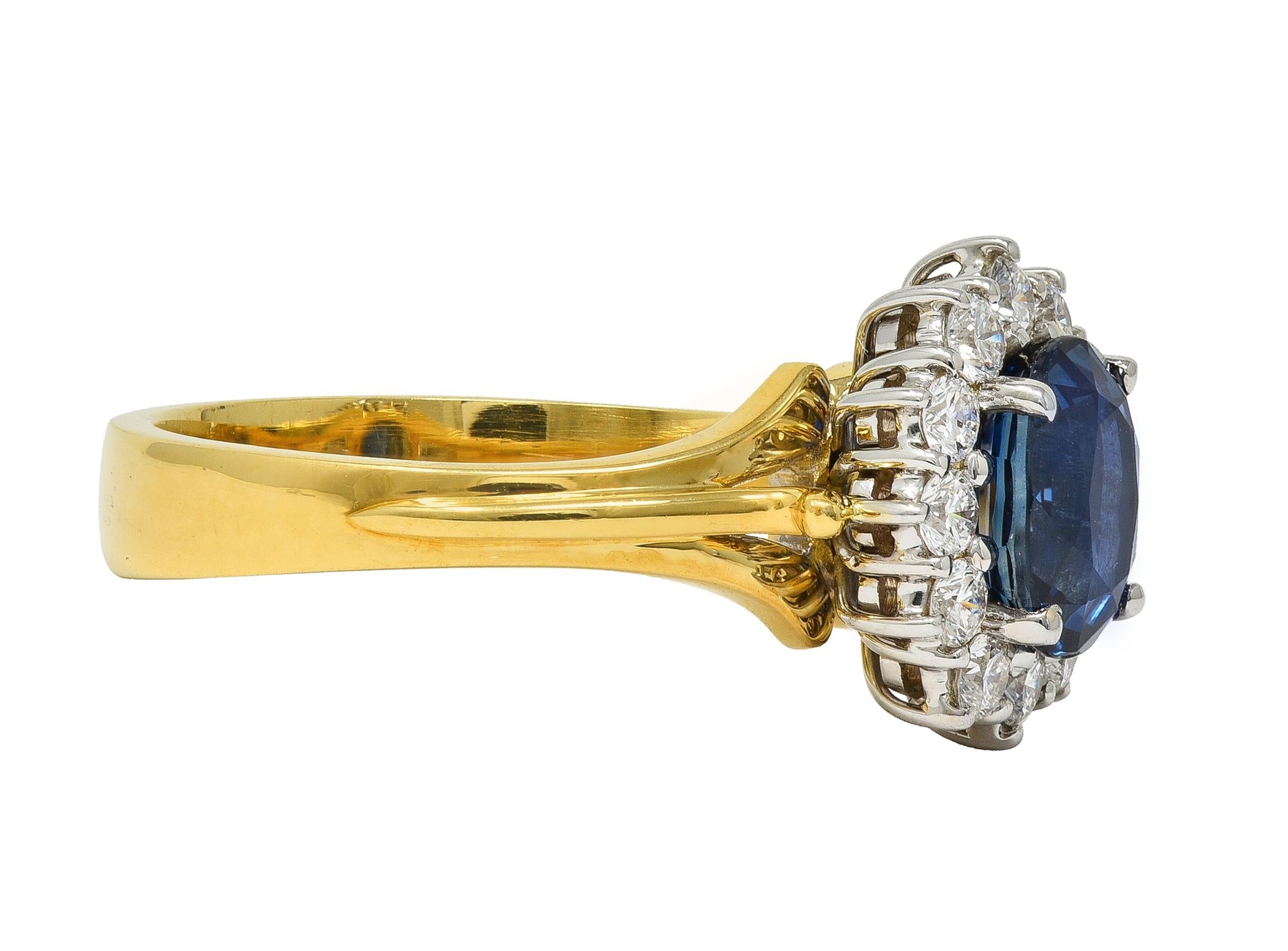 Spark 1990's 2.25 CTW Sapphire Diamond 18 Karat Two-Tone Gold Vintage Halo Ring