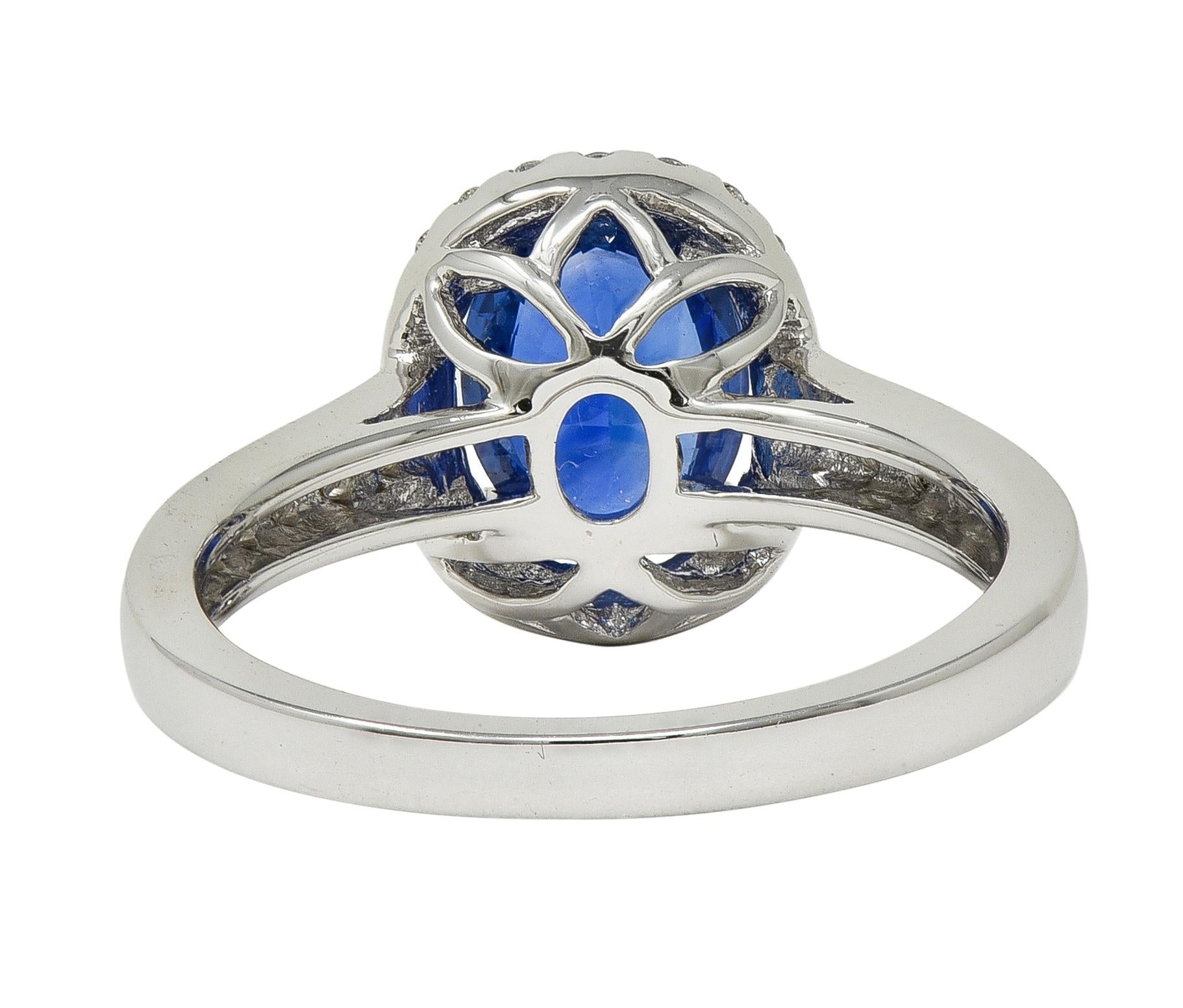 Contemporary 2.56 CTW Sapphire Diamond 18 Karat White Gold Halo Ring