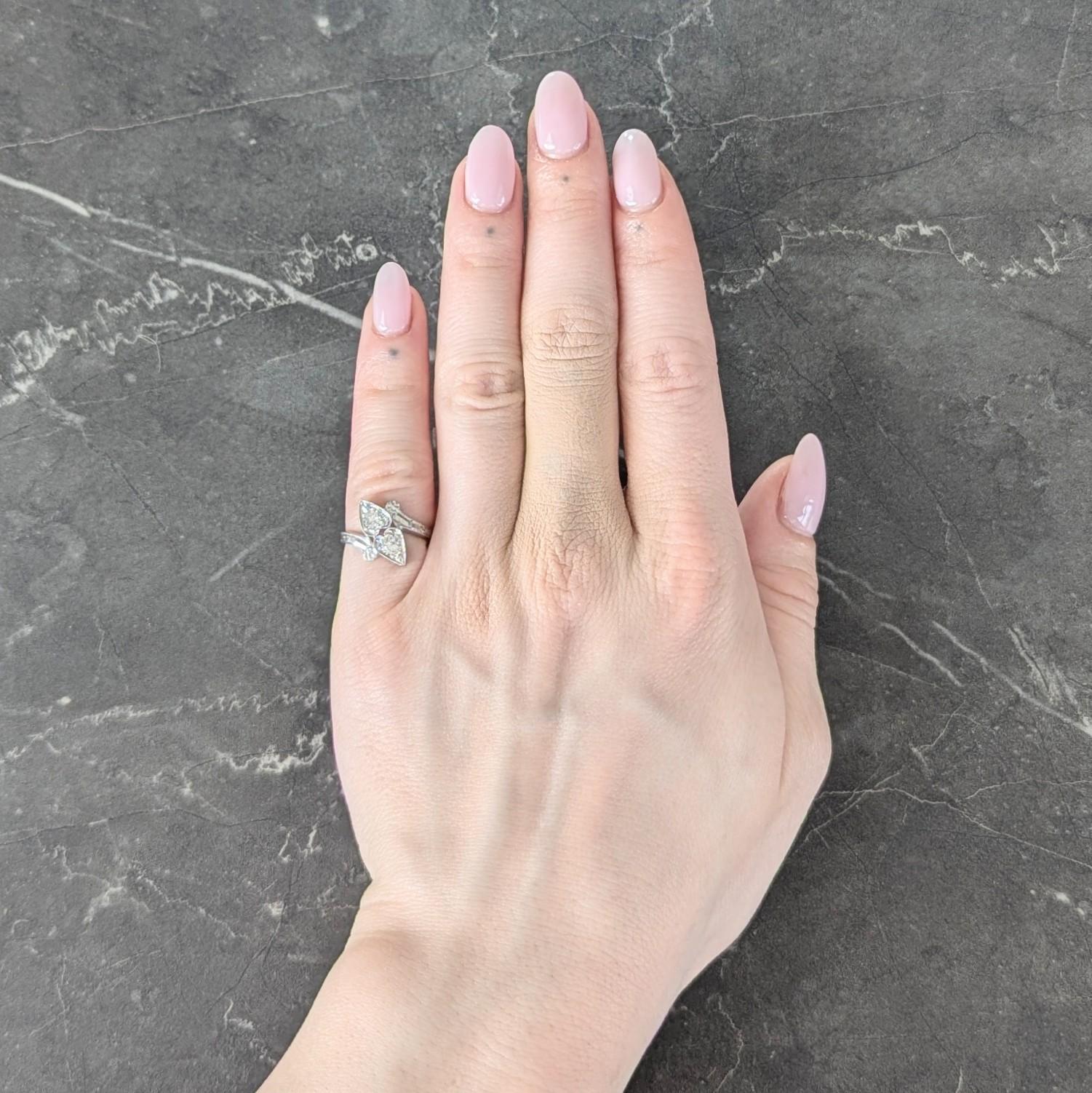 Retro Diamond 0.40 CTW 14 Karat White Gold Heart Vintage Bypass Ring