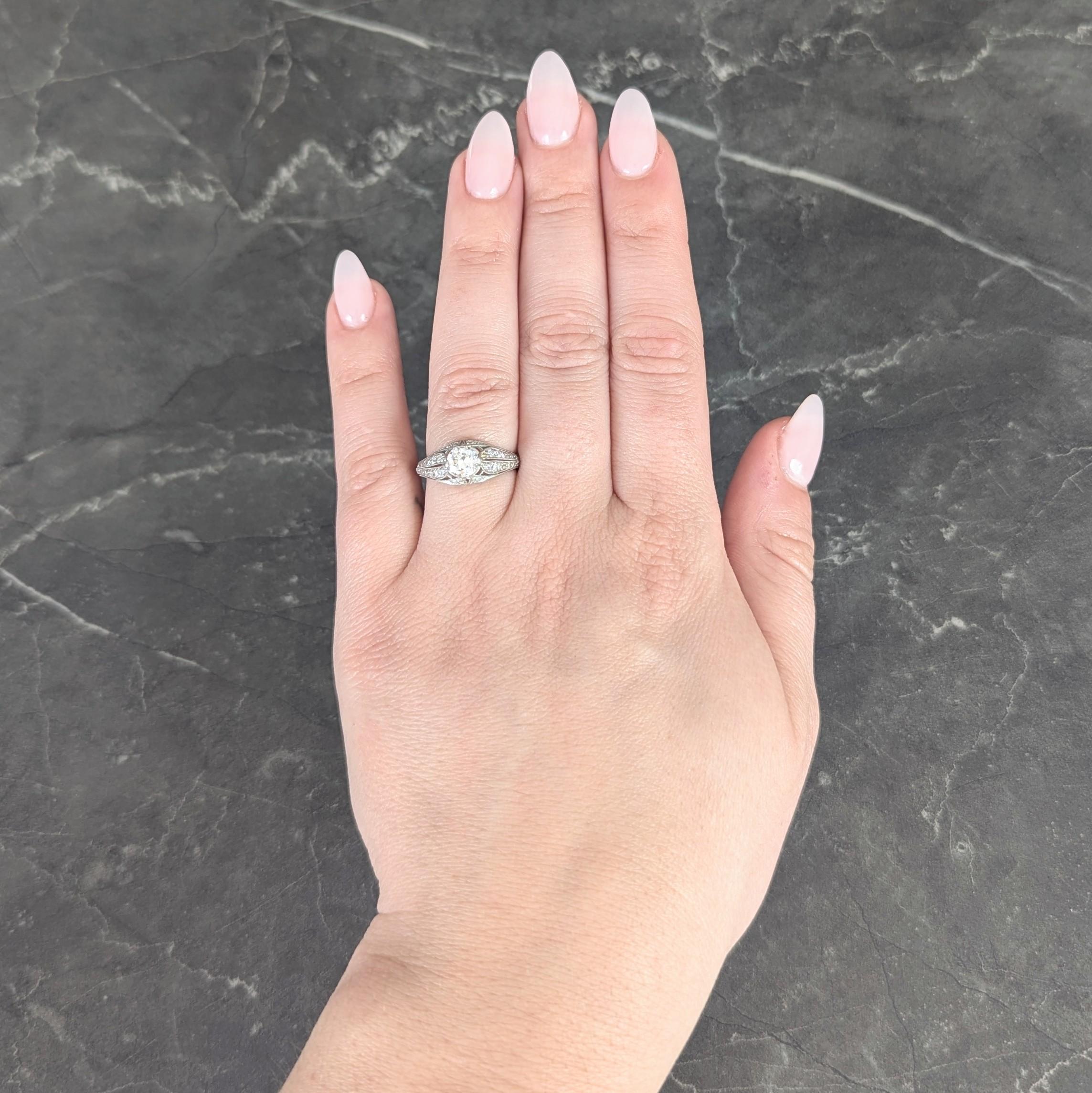 Late Art Deco 0.84 CTW Diamond Platinum Vintage Foliate Bombé Engagement Ring