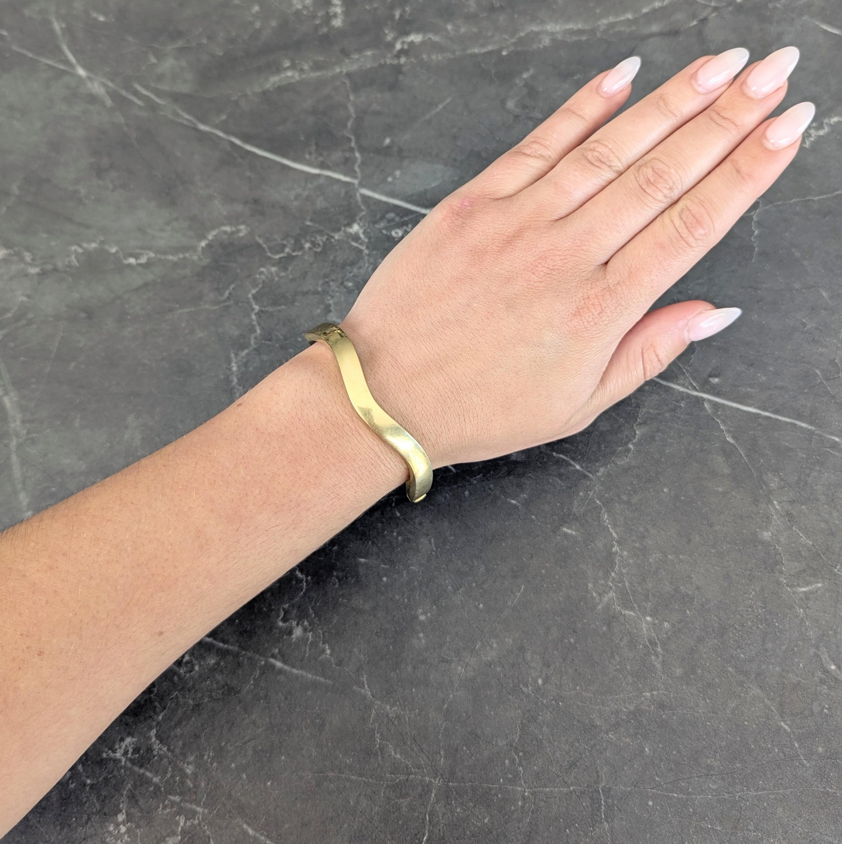 Tiffany & Co. 1990's 18 Karat Yellow Gold Vintage Wave Bangle Bracelet