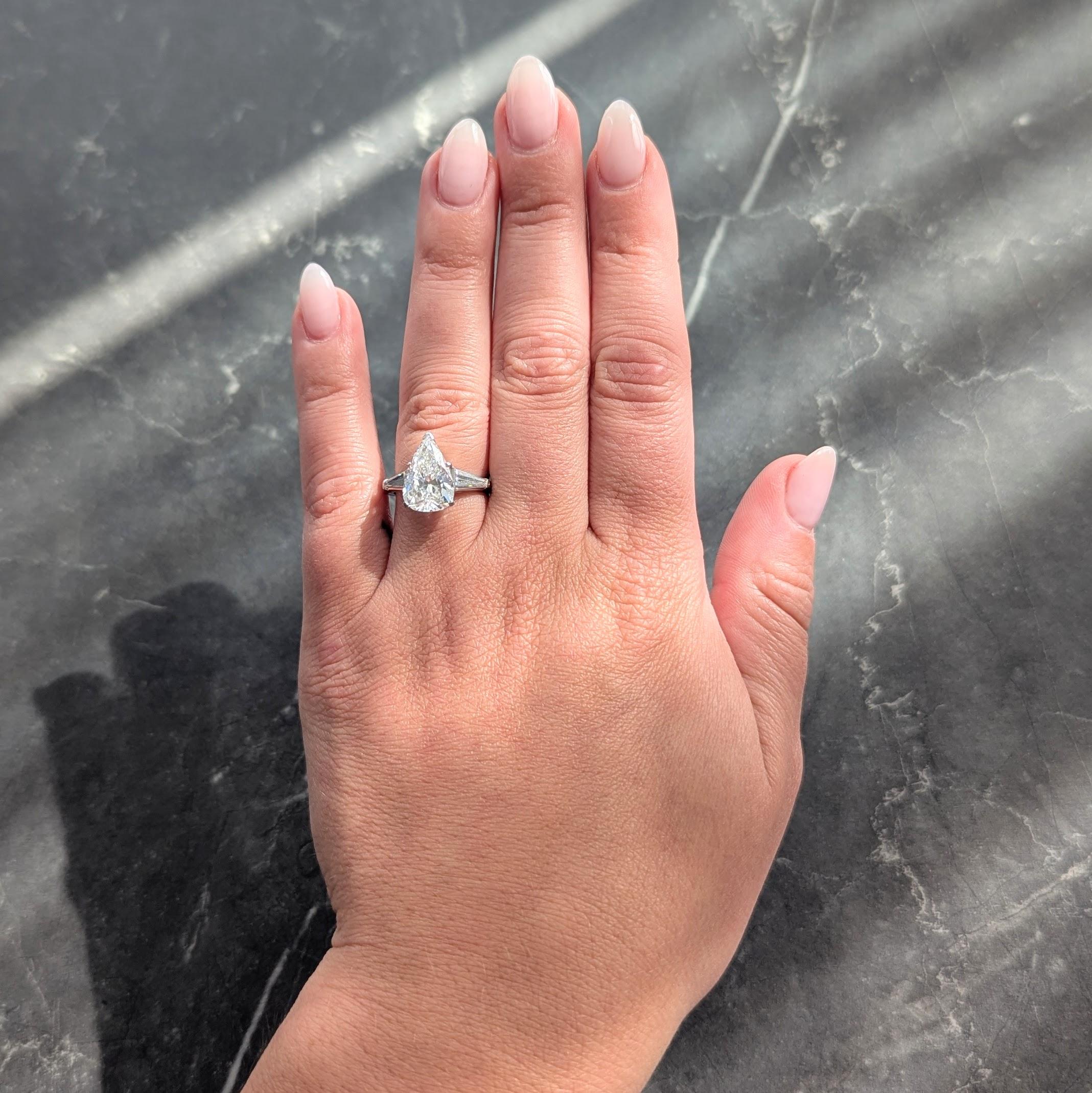 Mid-Century 4.04 CTW Pear Diamond Platinum Vintage Three Stone Engagement Ring