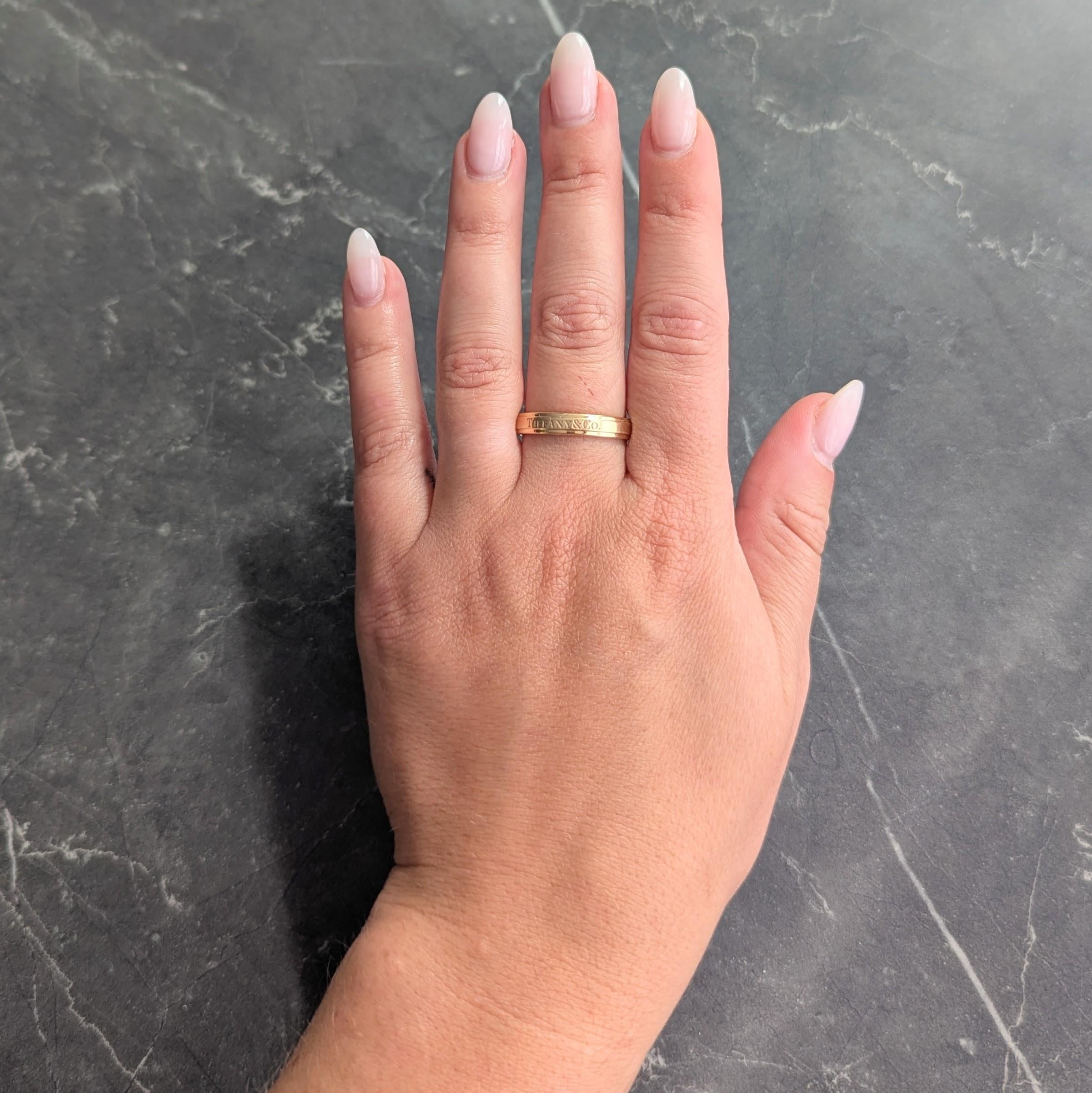 Tiffany & Co. 1990's 18 Karat Yellow Gold Vintage Logo Wedding Band Ring