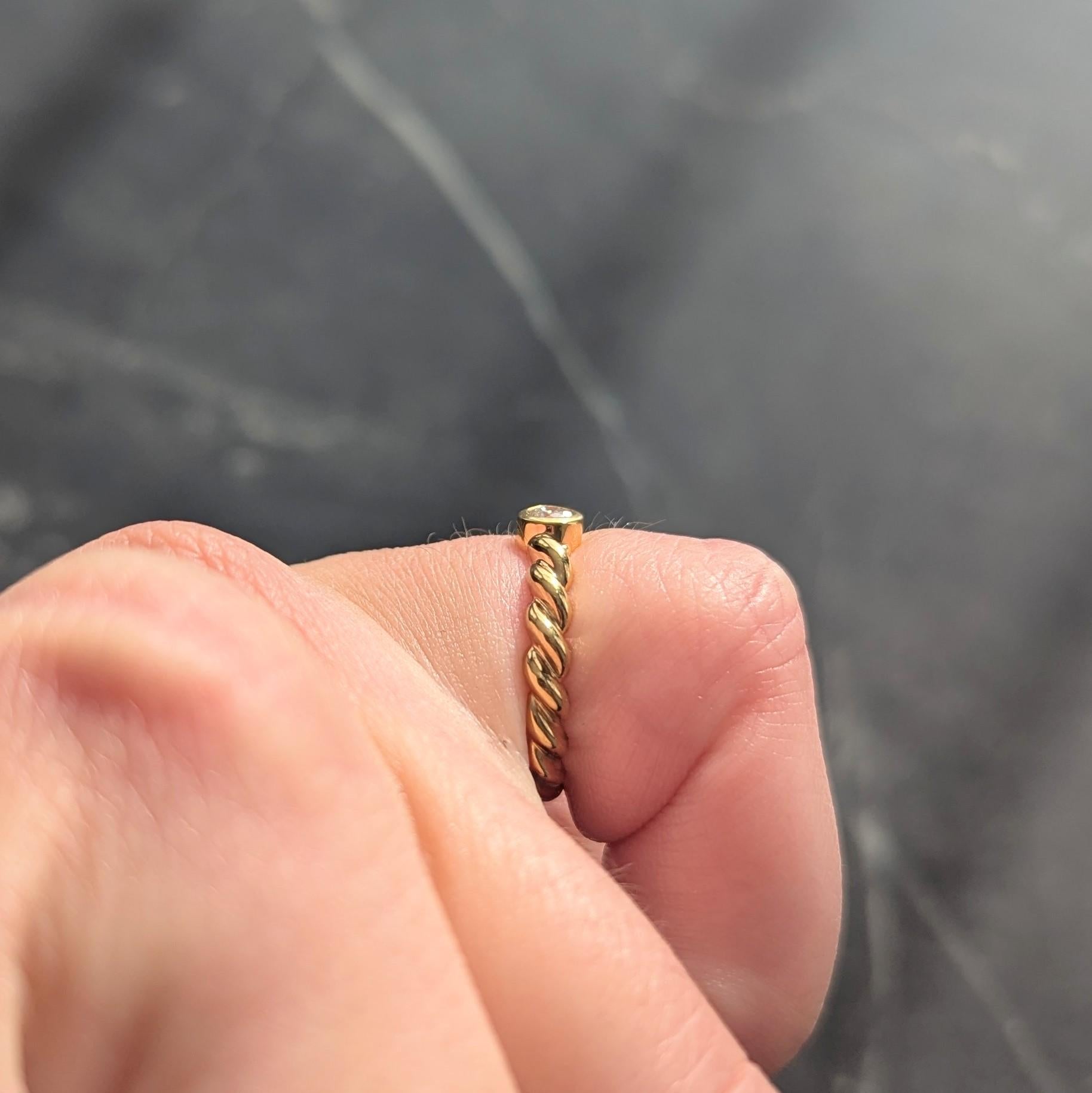 Tiffany & Co. 1990's Diamond 18 Karat Yellow Gold Vintage Twisted Rope Band Ring
