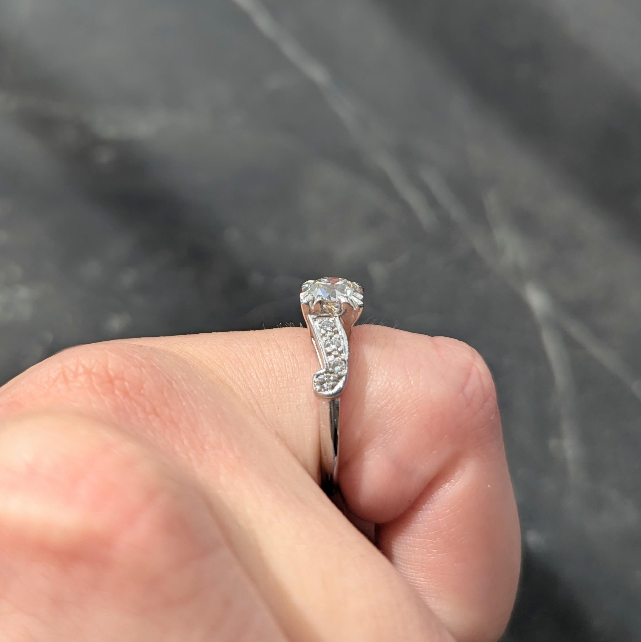 Mid-Century 1.11 CTW Diamond Platinum Scrolling Ribbon Vintage Engagement Ring