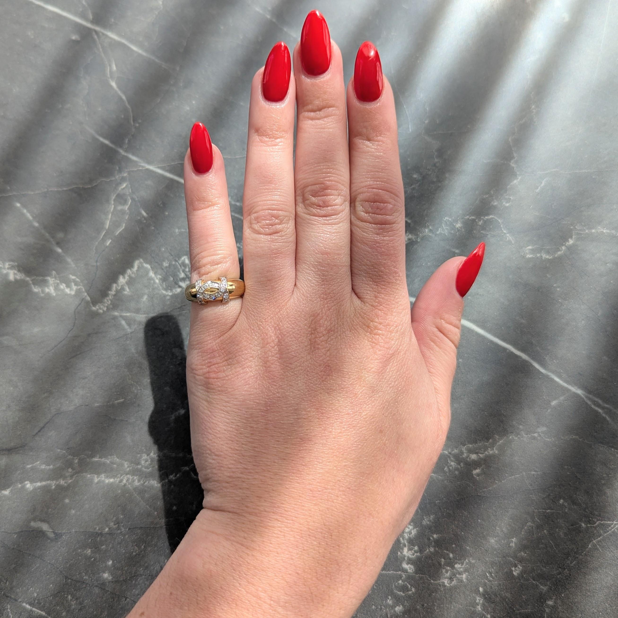 Cartier 1980's Diamond 18 Karat Two-Tone Gold Vintage Double C Cartier Band Ring