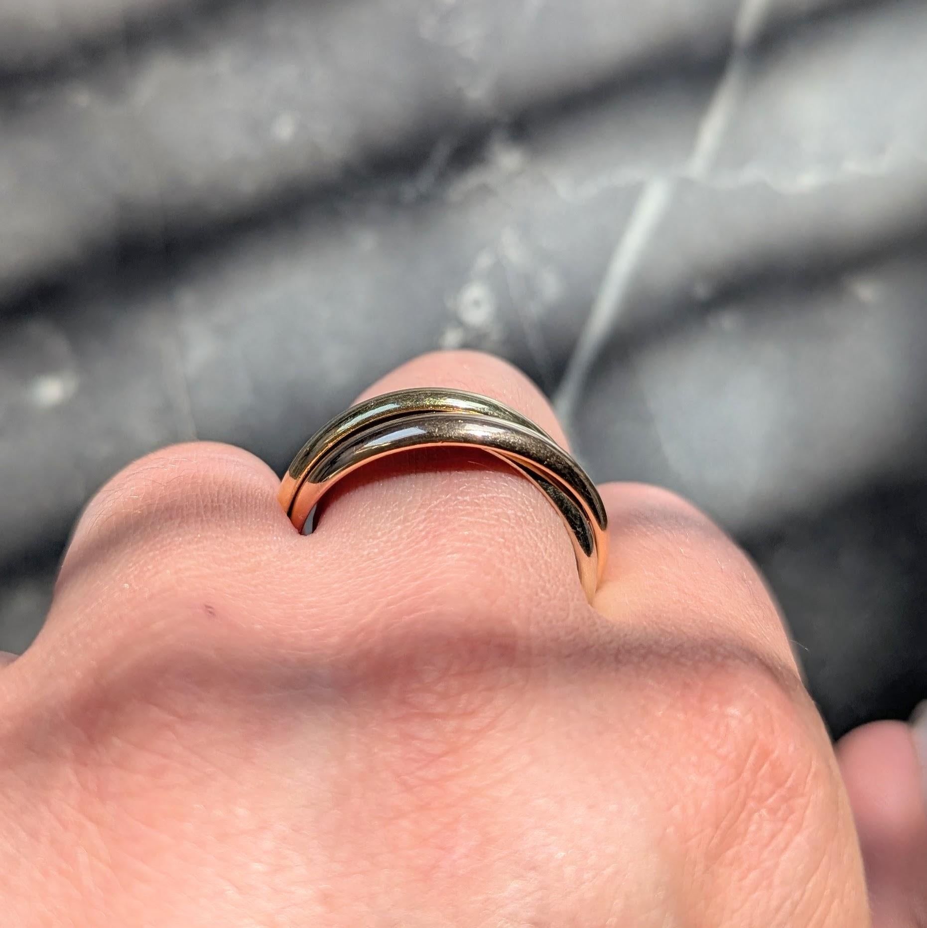 Cartier 1970's 18 Karat Tri-Colored Gold Vintage Rolling Trinity Band Ring