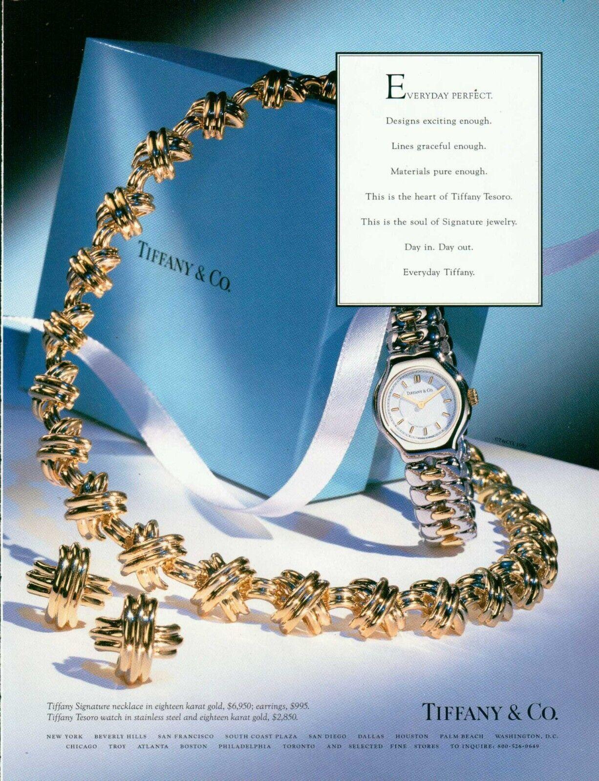 Tiffany & Co. 1990's 18 Karat Yellow Gold Vintage X Kiss Signature Earrings