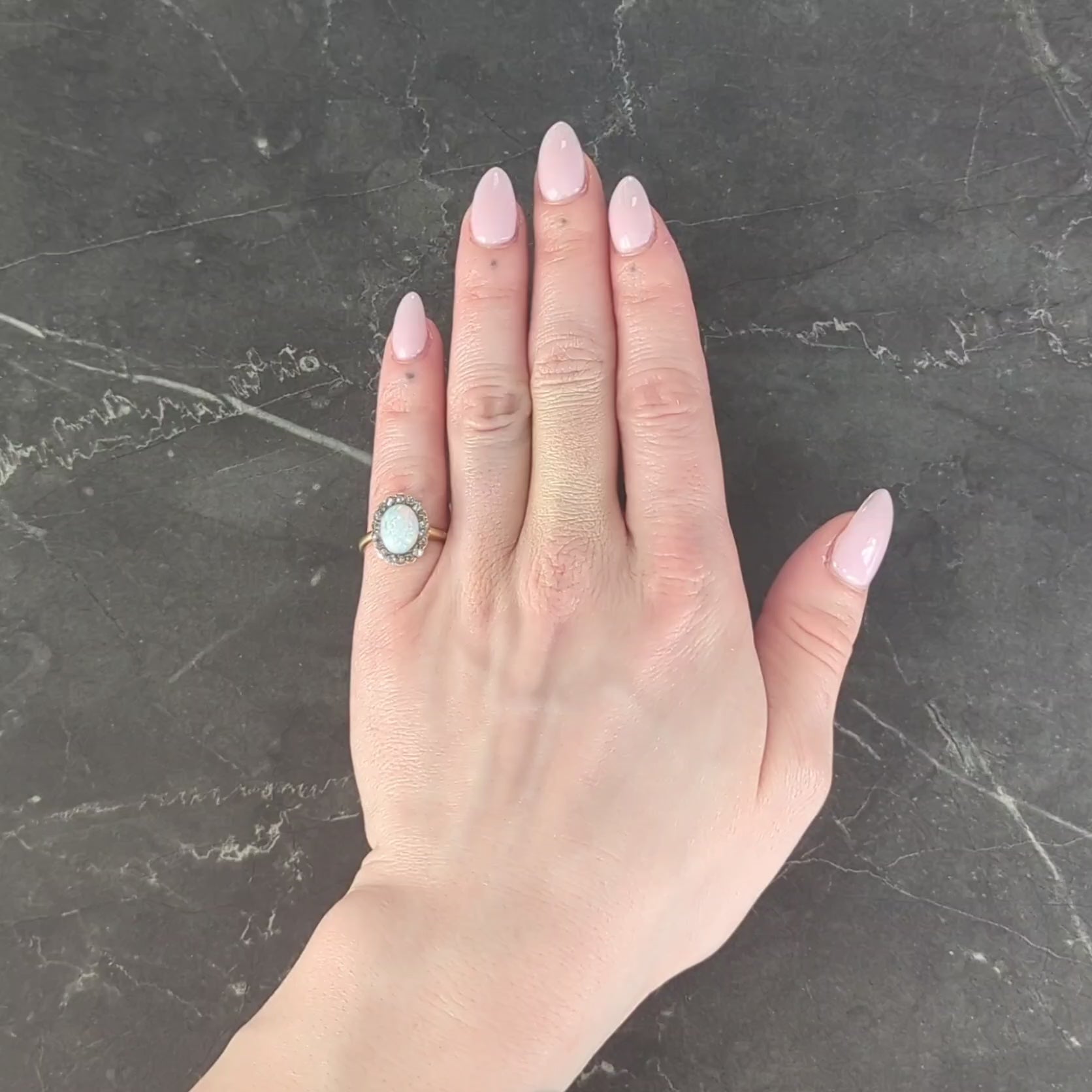 Early 1900's Opal Diamond 14 Karat Yellow Gold Antique Halo Ring