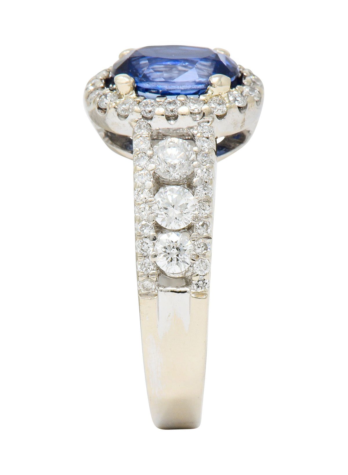 Contemporary 2.31 CTW Sapphire Diamond 18 Karat White Gold Halo Ring - Wilson's Estate Jewelry