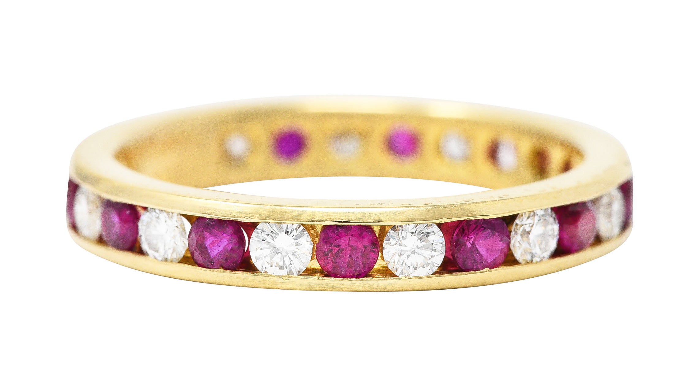 Tiffany & Co. 1990's 1.20 CTW Diamond Ruby 18 Karat Yellow Gold Vintage Eternity Channel Band Ring Wilson's Estate Jewelry
