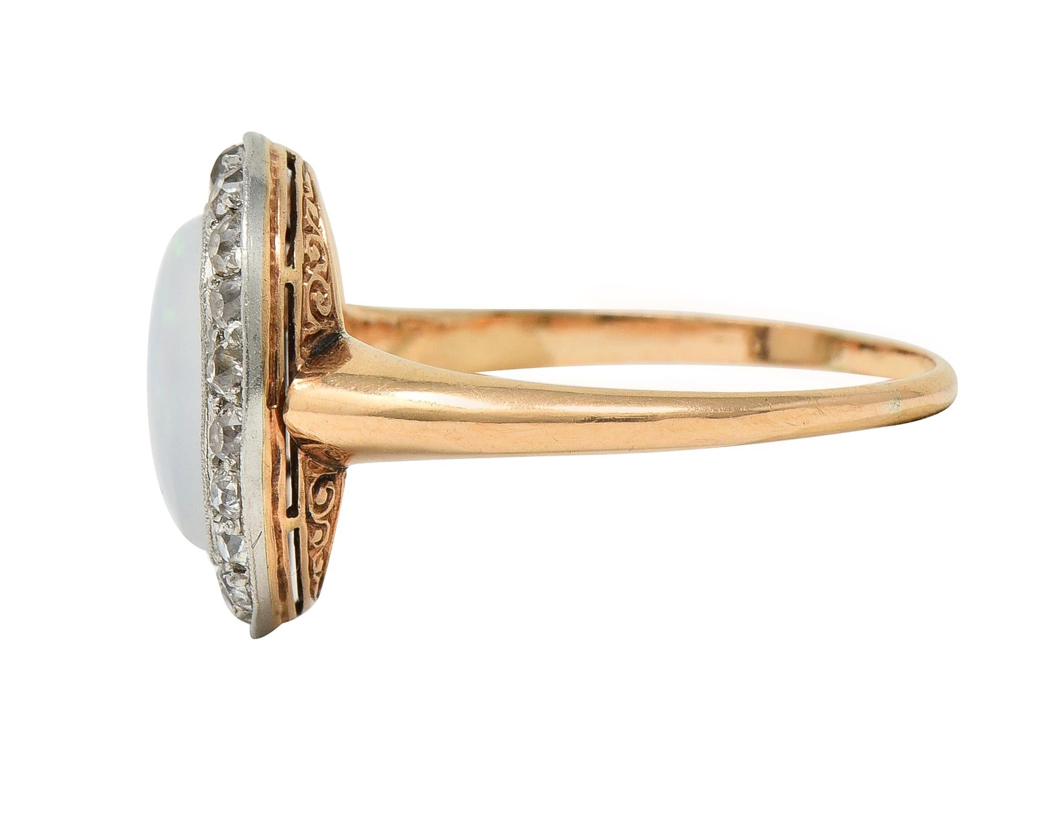 Edwardian Jelly Opal Diamond Platinum 18 Karat Rose Gold Antique Halo Ring