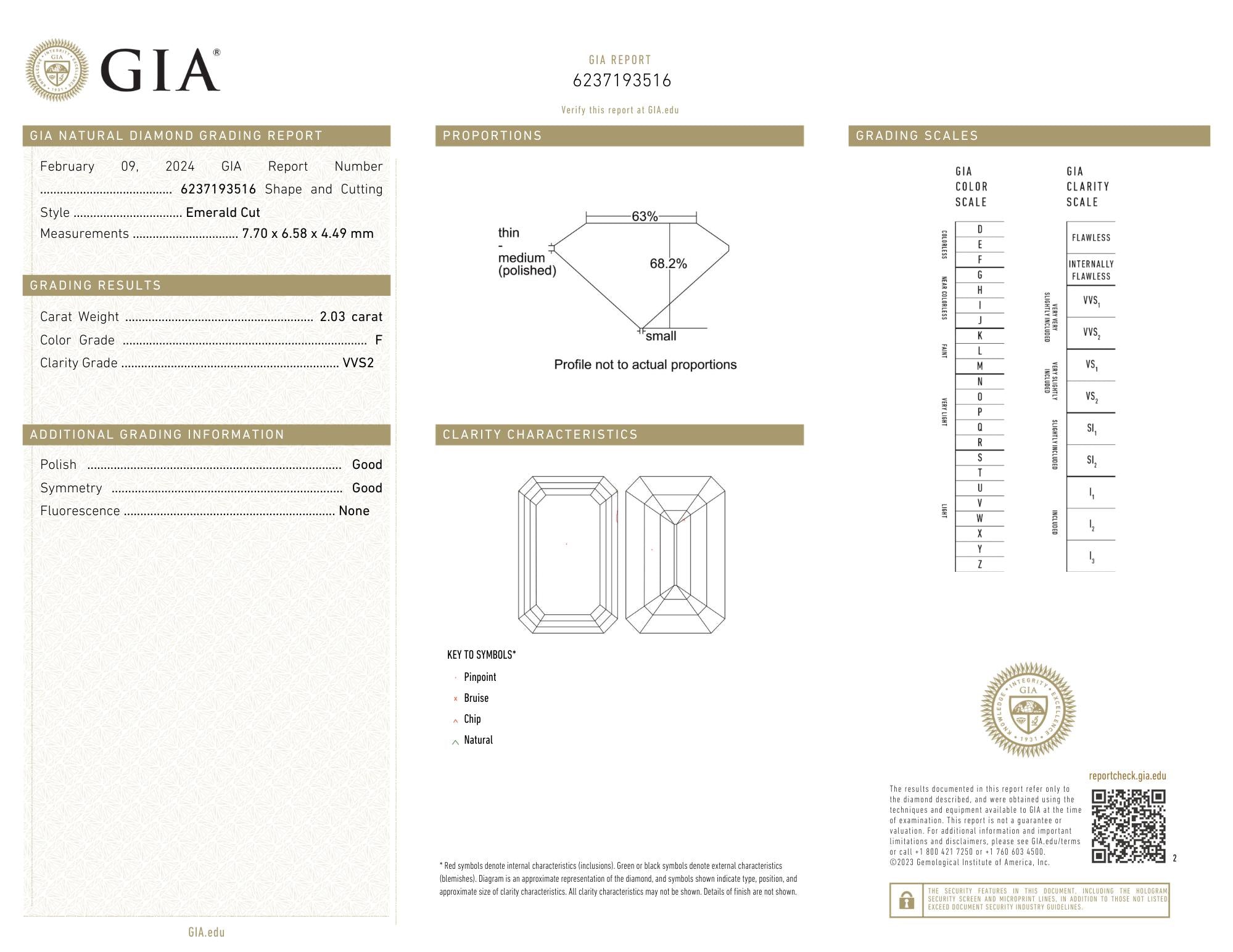 Mid-Century Emerald Cut Diamond Platinum Three Stone Vintage Engagement Ring