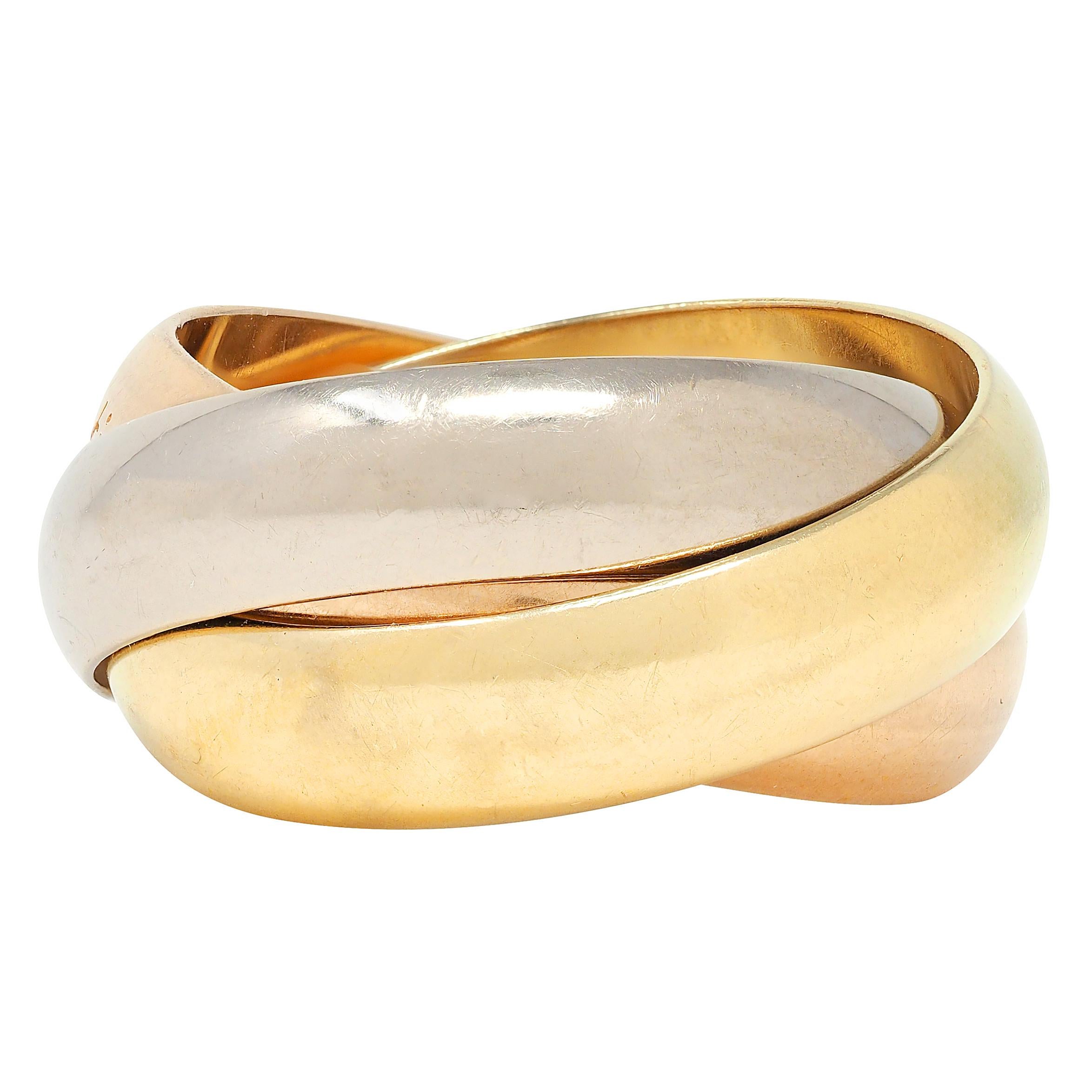 Cartier 1980's 18 Karat Tri-Gold Vintage Trinity Rolling Band Ring