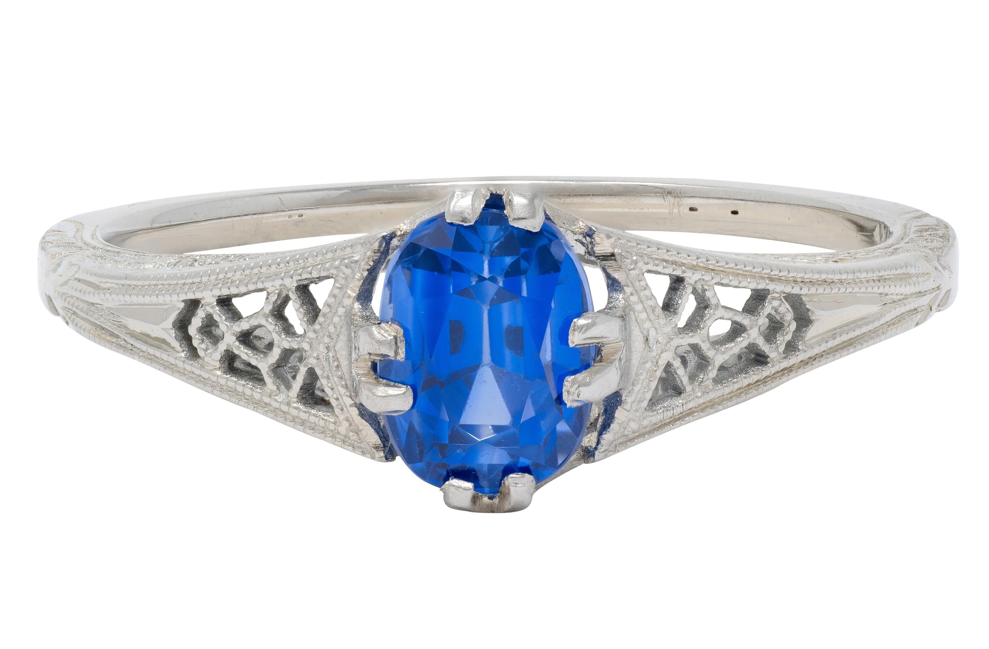 Art Deco 0.93 CTW Oval Cut Sapphire 18 Karat White Gold Vintage Lotus Ring