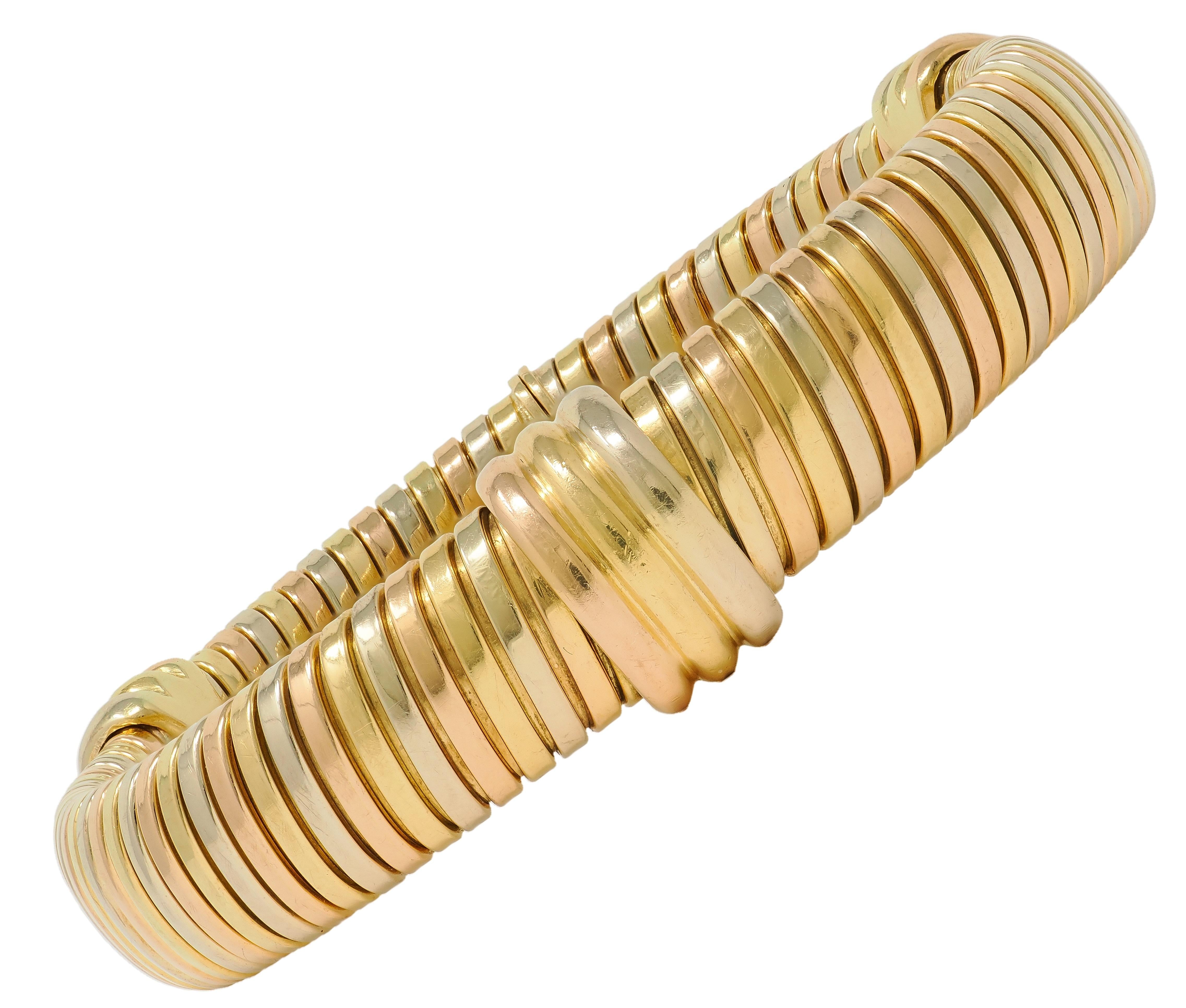 Cartier 1980's Tri-Colored  18 Karat Yellow White Gold Vintage Tubogas Bracelet