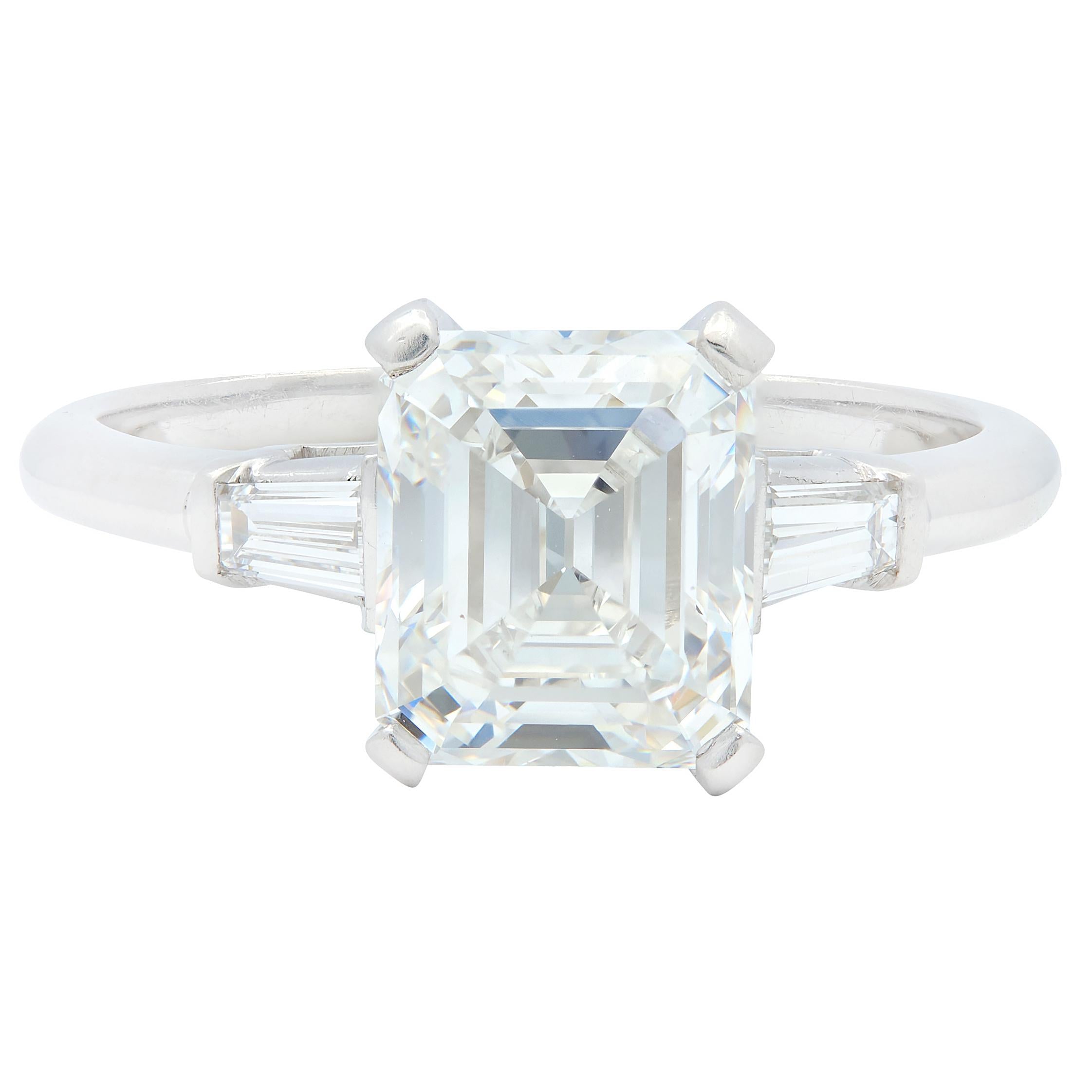 Mid-Century Emerald Cut Diamond Platinum Three Stone Vintage Engagement Ring