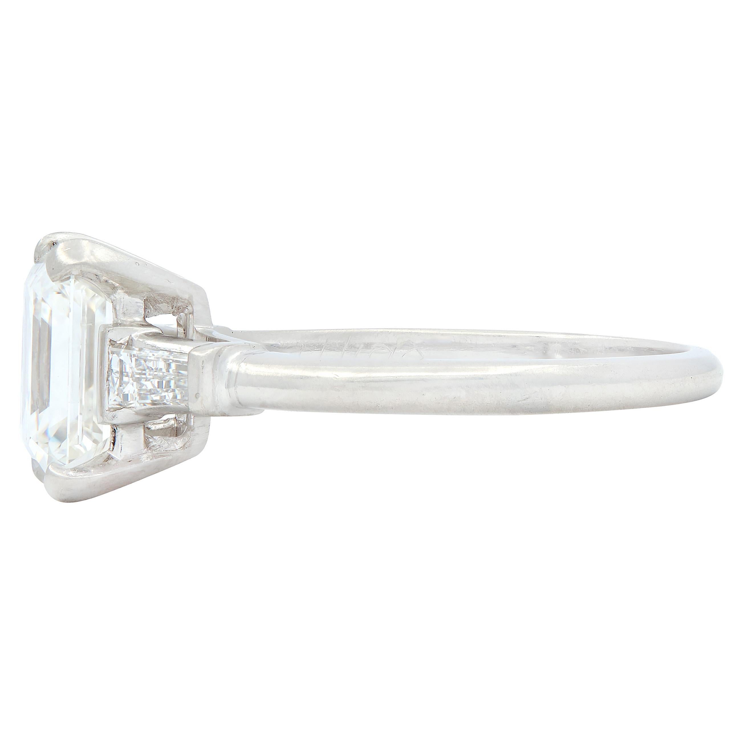 Mid-Century Emerald Cut Diamond Platinum Three Stone Vintage Engagement Ring