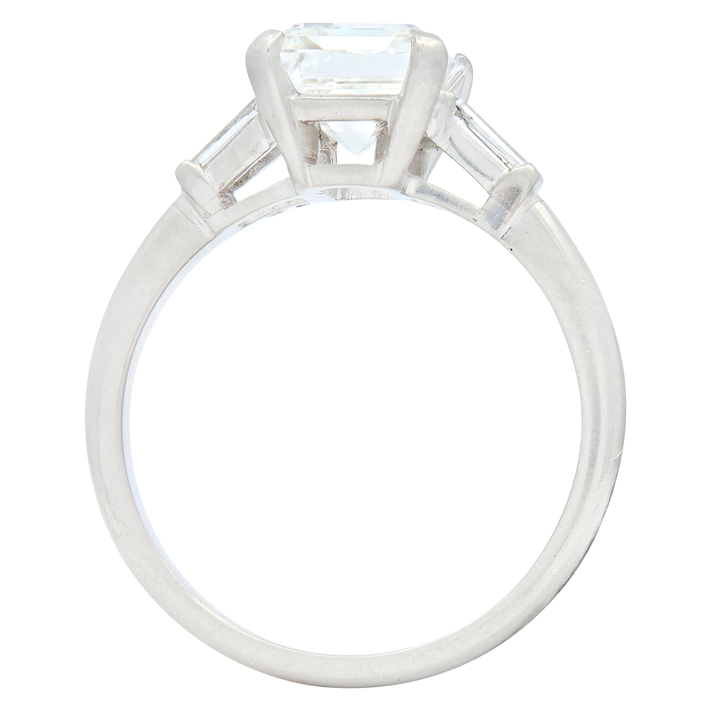 Mid-Century Emerald Cut Diamond Platinum Three Stone Vintage Engagement Ring