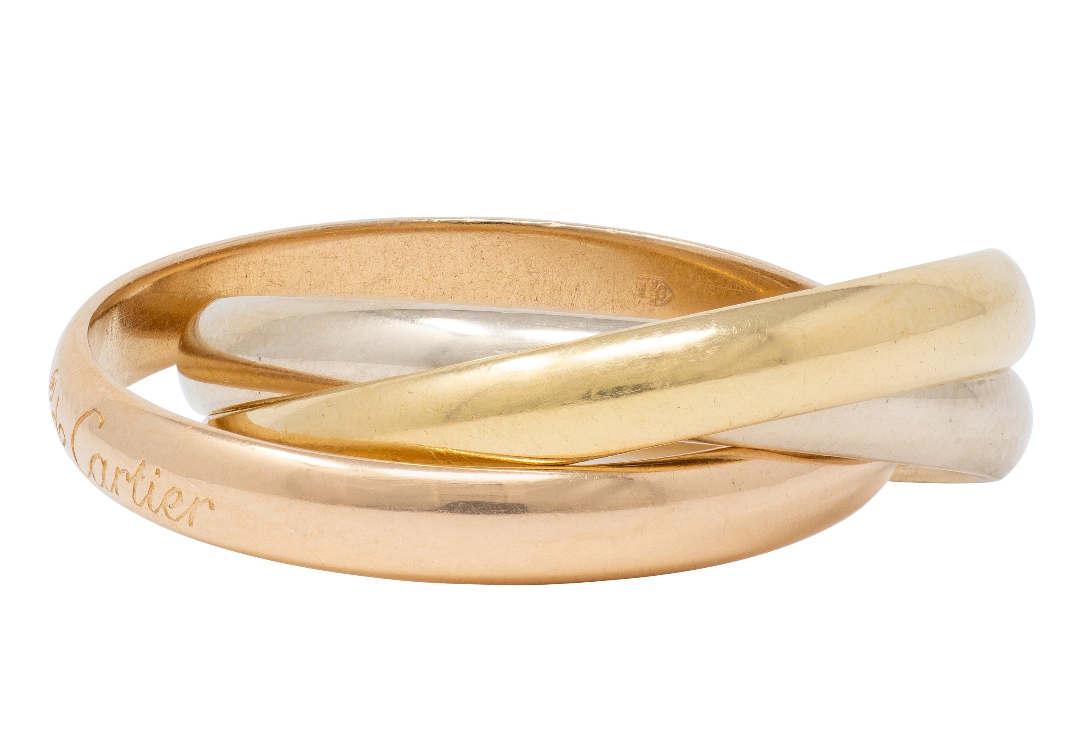Cartier 1970's 18 Karat Tri-Colored Gold Vintage Rolling Trinity Band Ring
