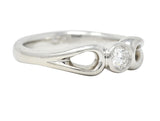 Elsa Peretti Tiffany & Co. 1990's 0.16 CTW Diamond Platinum Open Teardrop Solitaire Vintage Engagement Ring Wilson's Estate Jewelry