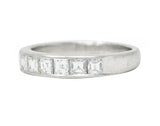 Contemporary 0.72 CTW Square Step Cut Diamond Platinum Five Stone Channel Band Ring Wilson's Estate Jewelry