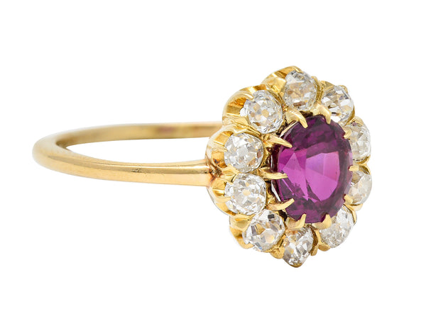 Victorian 1.82 CTW Oval Cut Ruby Old Mine Cut Diamond 14 Karat Yellow Gold Antique Cluster Ring Wilson's Estate Jewelry