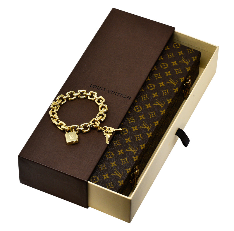 Louis Vuitton Gold Charm Bracelet  Gold charm bracelet, Louis vuitton  jewelry, Gold charm