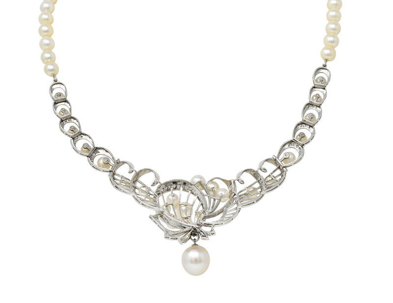 Mikimoto 1950's Diamond Pearl 14 Karat White Gold Fanning Ribbon Vintage Station Necklace Wilson's Estate Jewelry