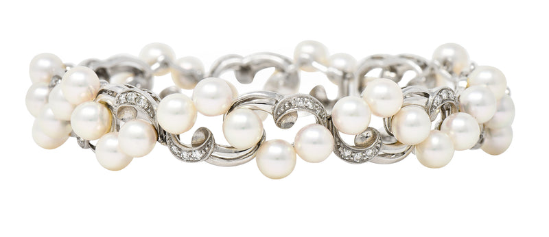 Mikimoto Mid-Century Diamond Cultured Pearl 14 Karat White Gold Scrolling Ribbon Vintage Bracelet Wilson's Estate Jewelry