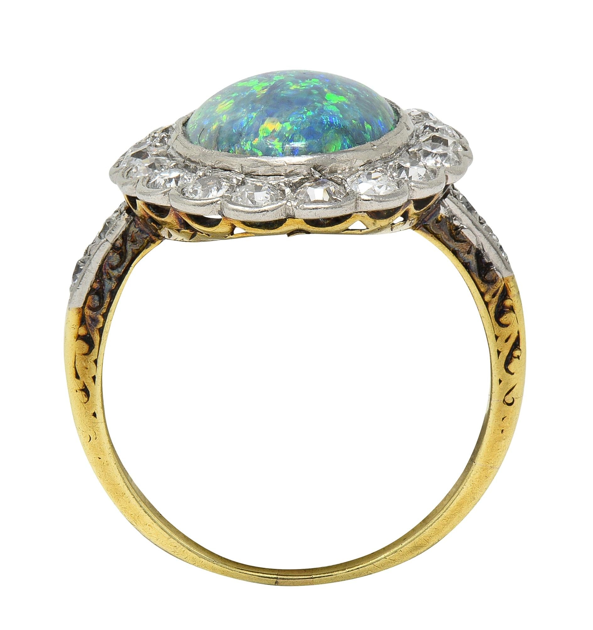 Edwardian Black Opal Diamond Platinum 18 Karat Yellow Gold Antique Halo Ring