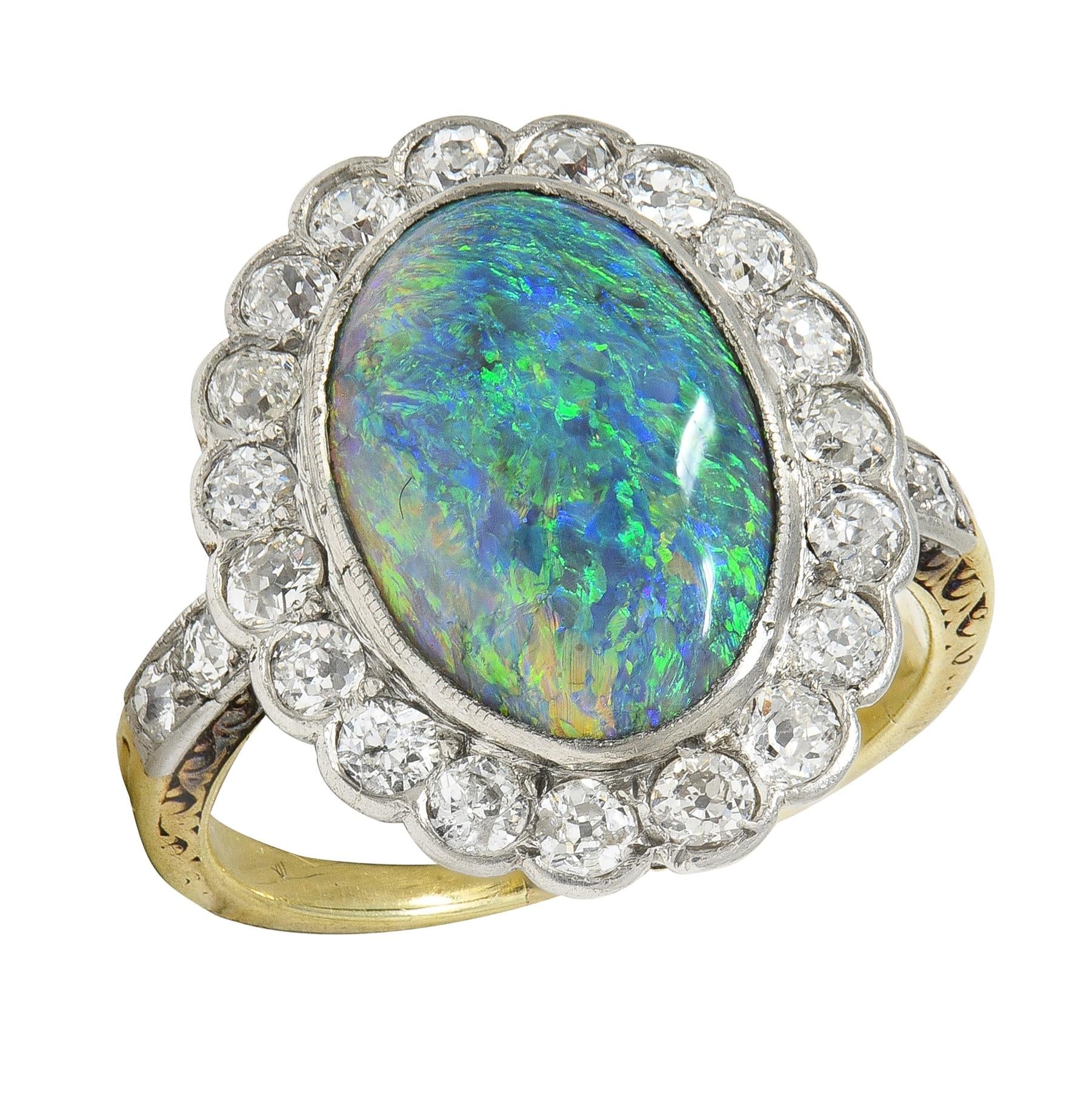 Edwardian Black Opal Diamond Platinum 18 Karat Yellow Gold Antique Halo Ring