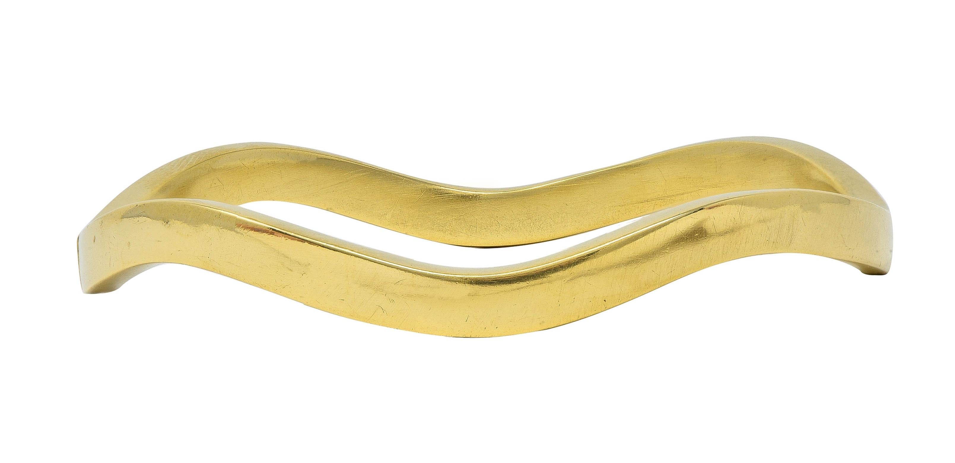 Tiffany & Co. 1980's 18 Karat Yellow Gold Vintage Inscribed Wave Bangle Bracelet