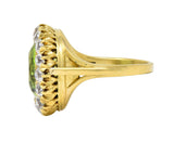 Antique 6.78 CTW Peridot Diamond 18 Karat Yellow Gold Halo Ring