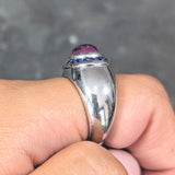 Boucheron French Modernist 5.08 CTW Purple Sapphire Cabochon 18 Karat White Gold Halo Vintage Ring Wilson's Estate Jewelry