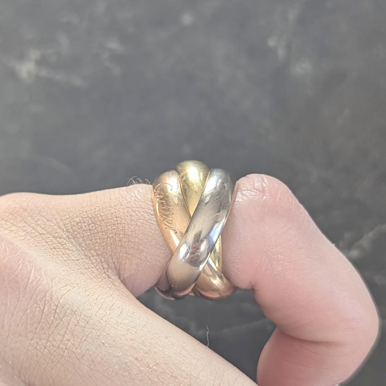 Cartier 1980's 18 Karat Tri-Gold Vintage Trinity Rolling Band Ring