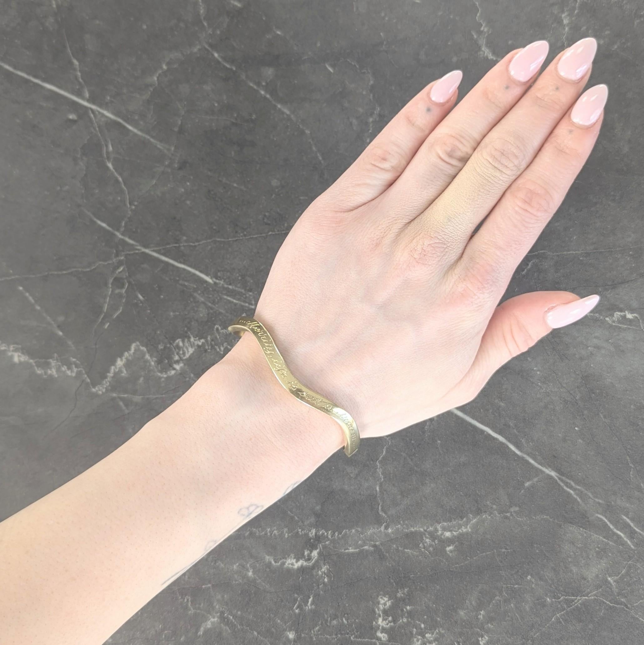 Tiffany & Co. 1980's 18 Karat Yellow Gold Vintage Inscribed Wave Bangle Bracelet