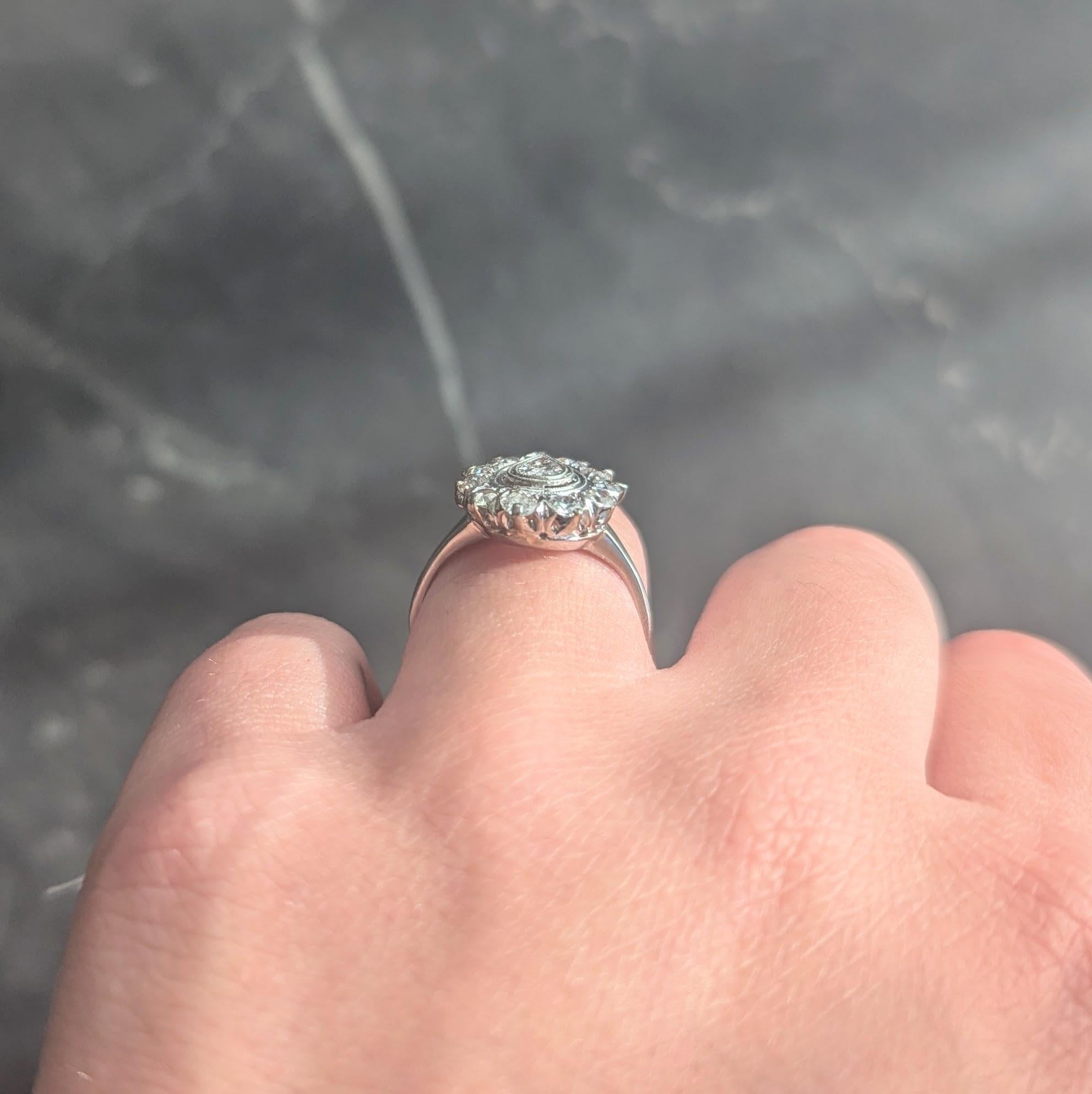 Mid-Century 0.88 CTW Pear Cut Diamond Platinum Vintage Halo Ring