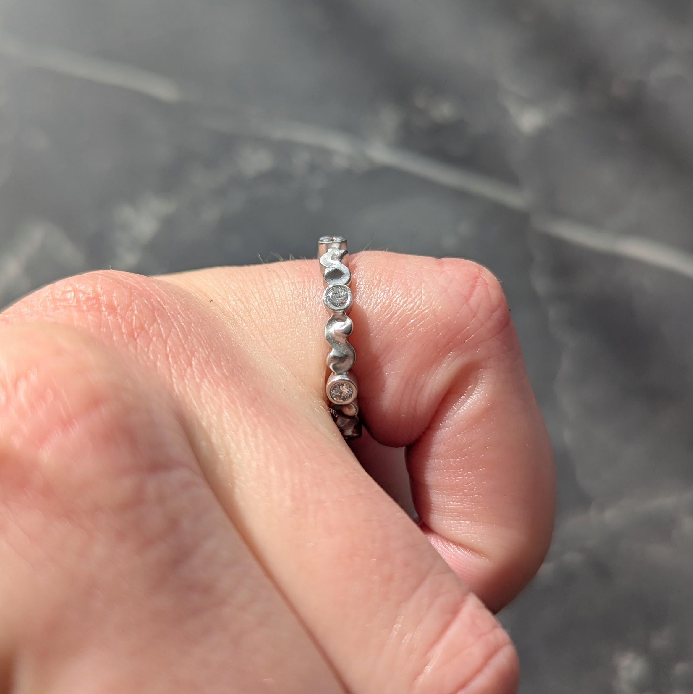 1990's Diamond 14 Karat White Gold Vintage Scrolling Bezel Band Ring