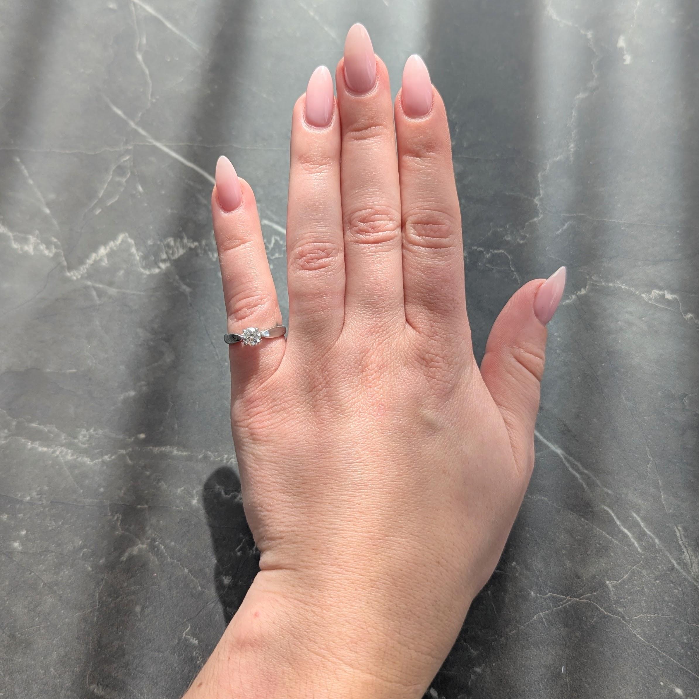 Tiffany & Co. Round Brilliant Diamond Platinum Harmony Solitaire Engagement Ring