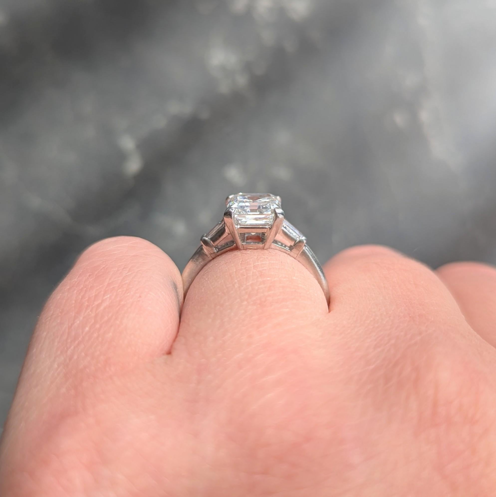 Mid-Century Emerald Cut Diamond Platinum Three Stone Vintage Engagement Ring