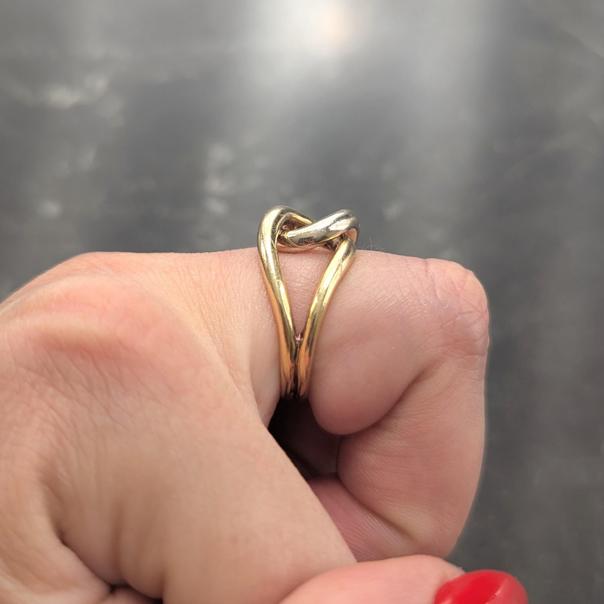 Cartier 1970's 18 Karat Two-Tone Yellow White Gold Vintage locking Loop Ring